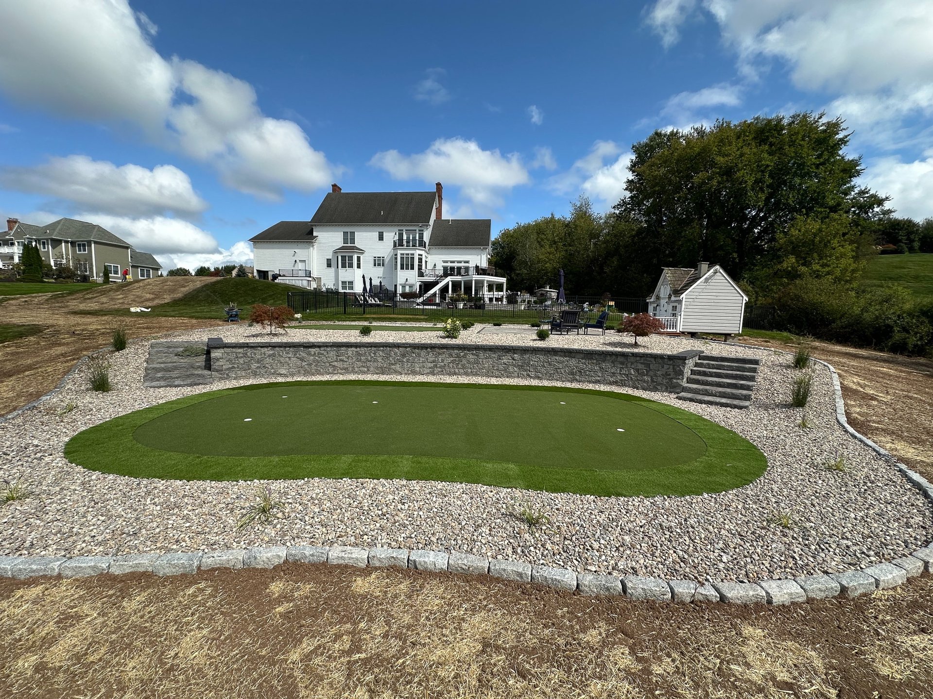 woman wearing yellow long-sleeved dress under white clouds and blue sky during daytime