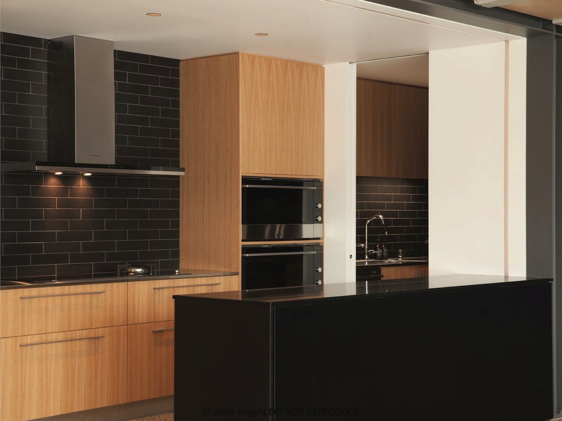 Architectural Kitchen by Qualitas Builders in Auckland