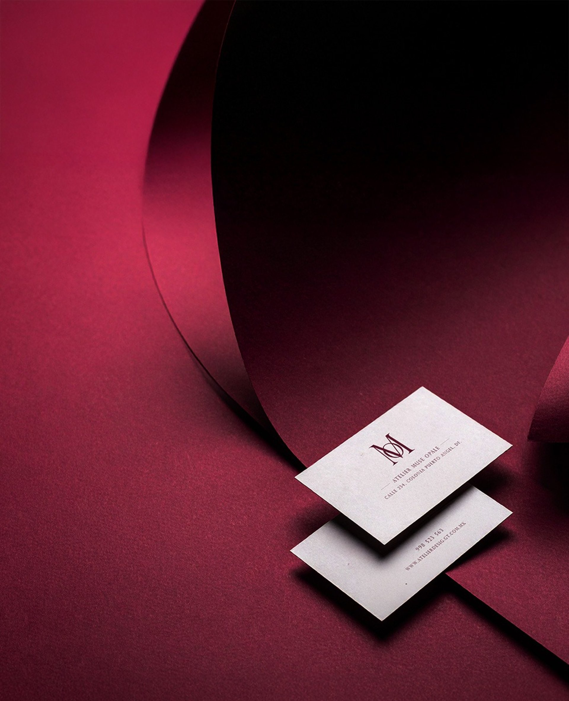 an abstract photo of a curved building with a blue sky in the background