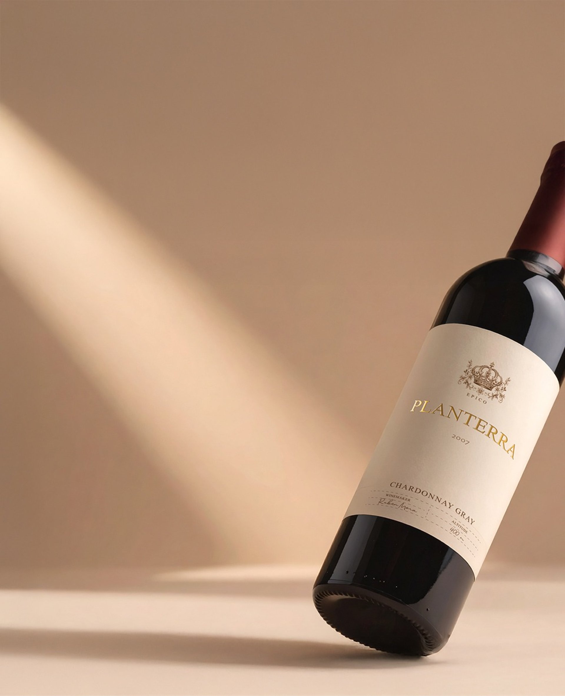 an abstract photo of a curved building with a blue sky in the background