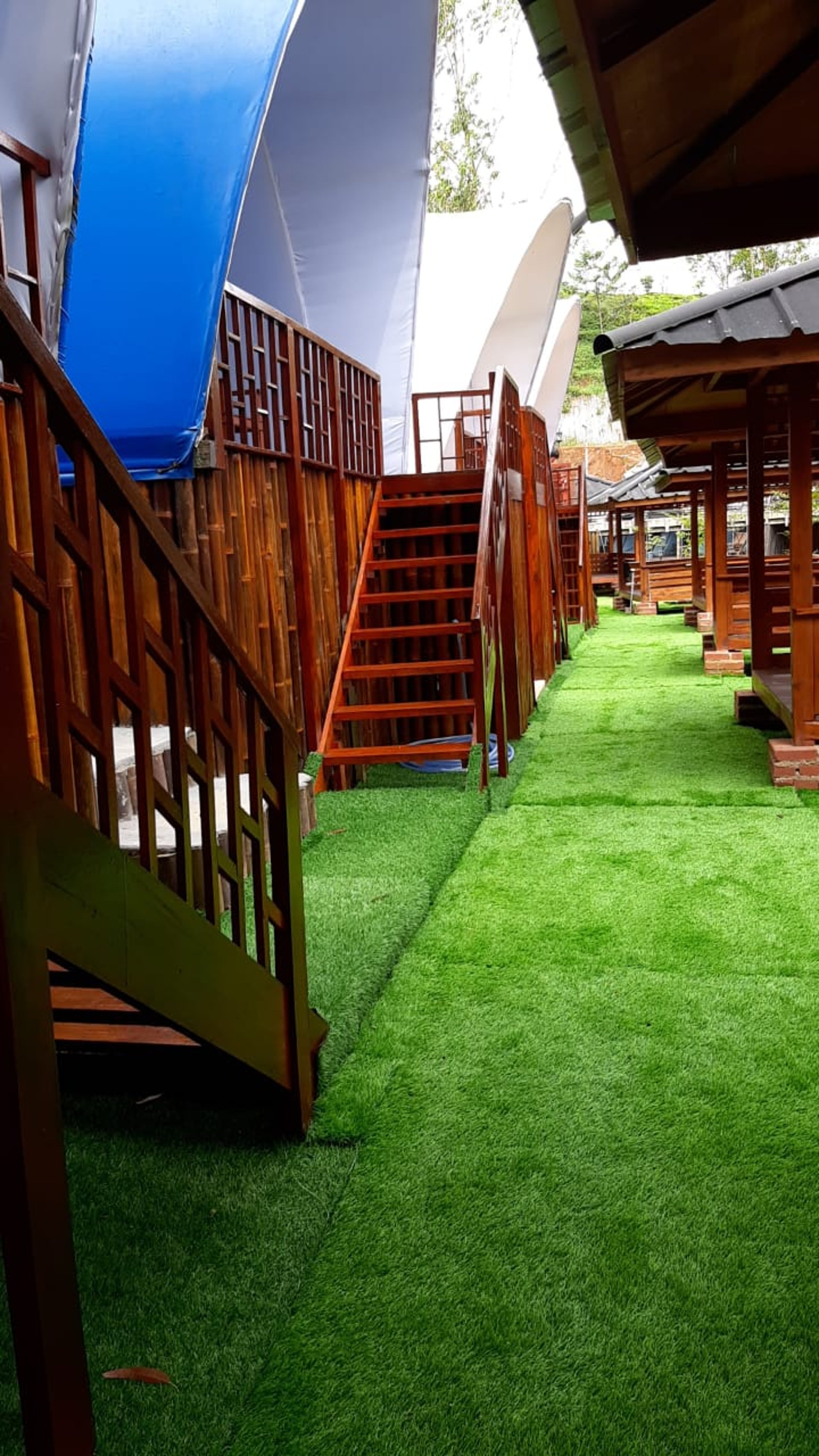 black and brown leather padded tub sofa
