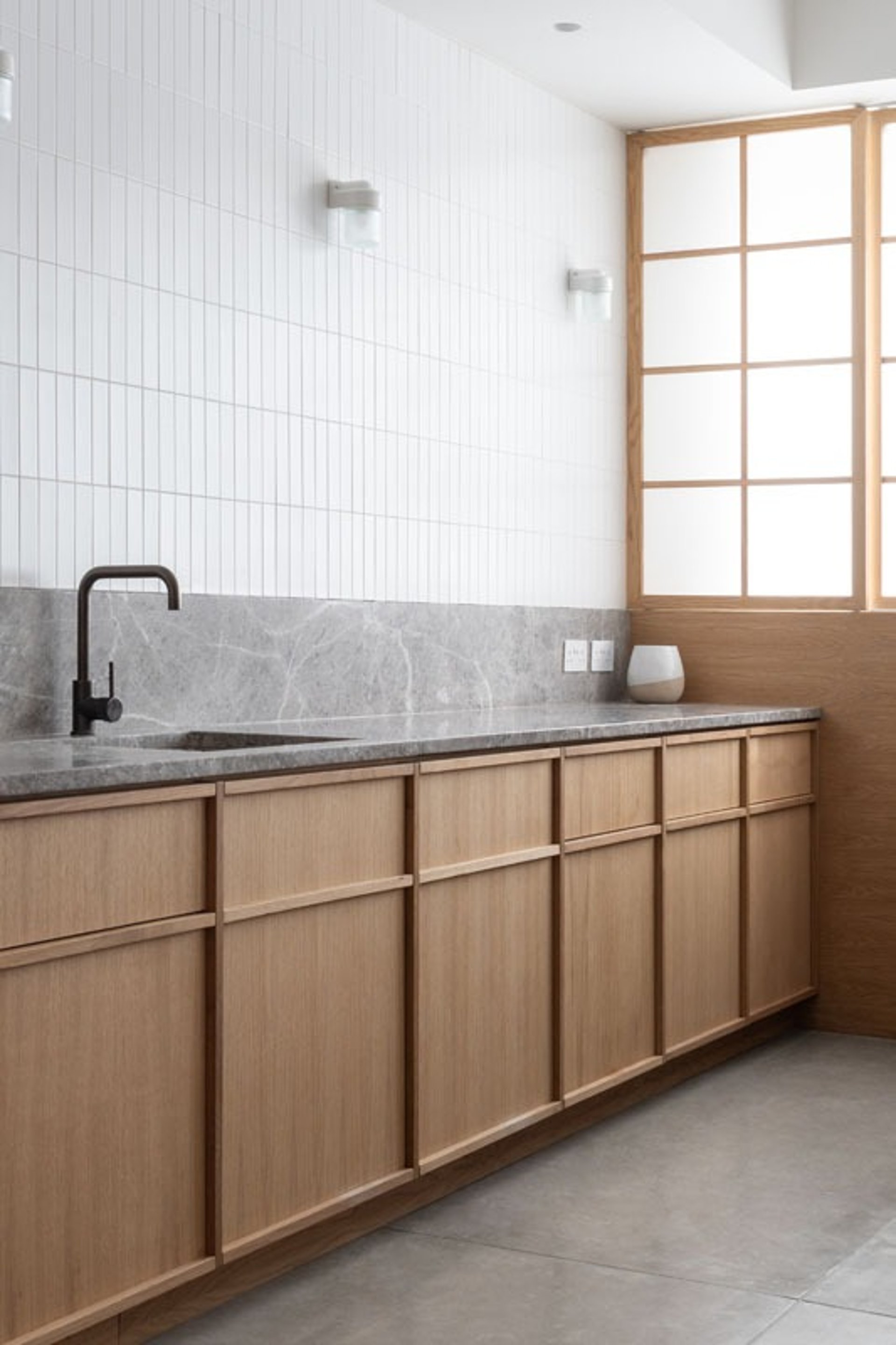 woman wearing yellow long-sleeved dress under white clouds and blue sky during daytime