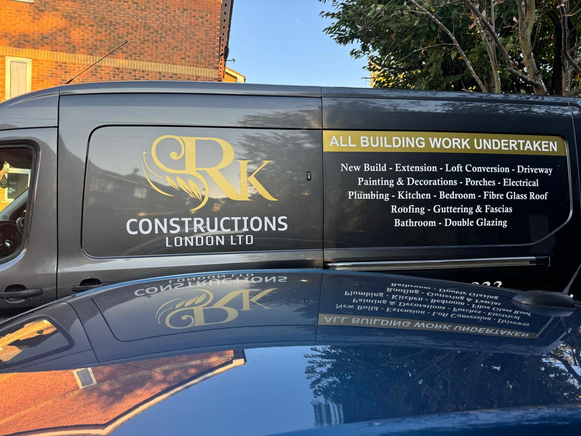 man standing infront of miter saw