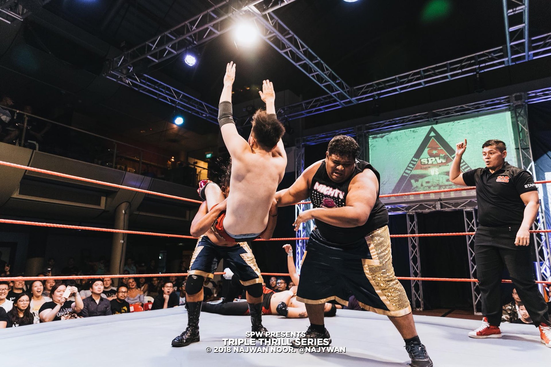 an abstract photo of a curved building with a blue sky in the background