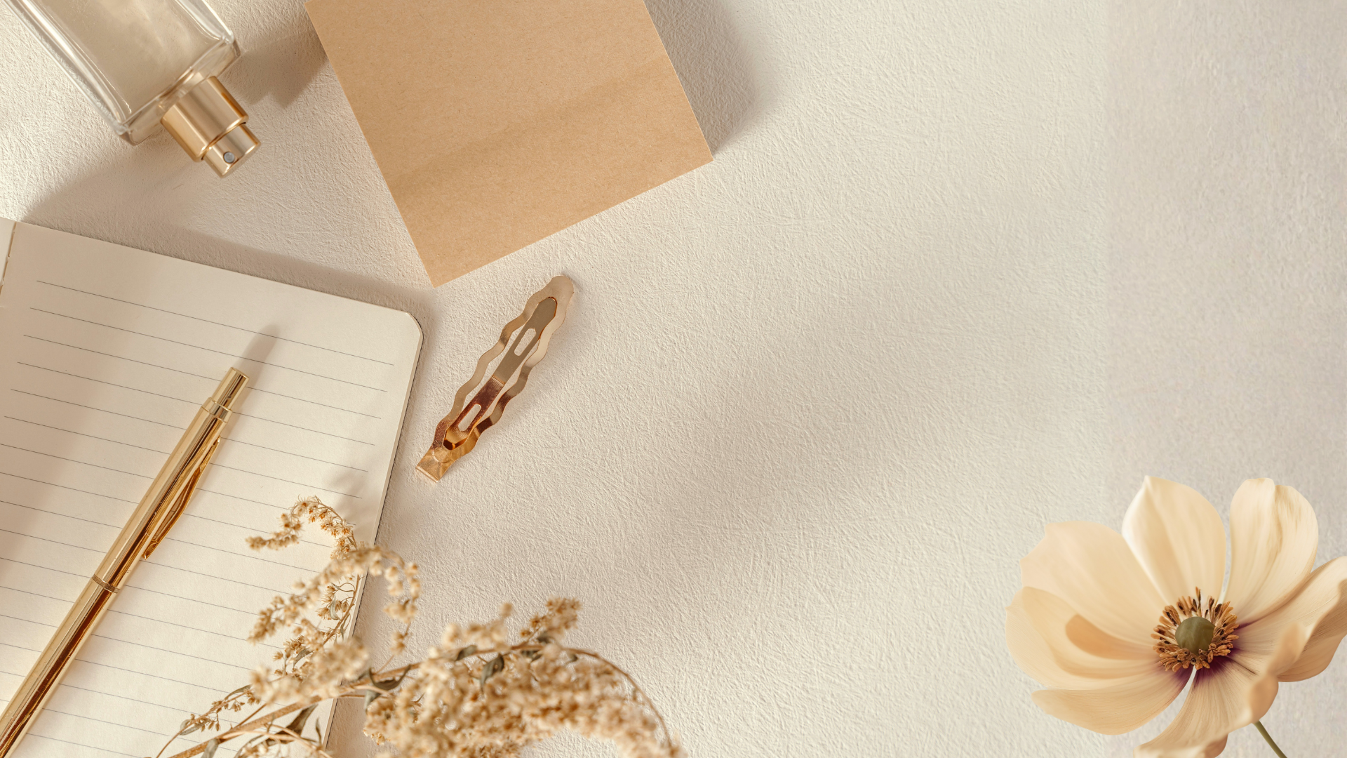 white and gold box on white textile