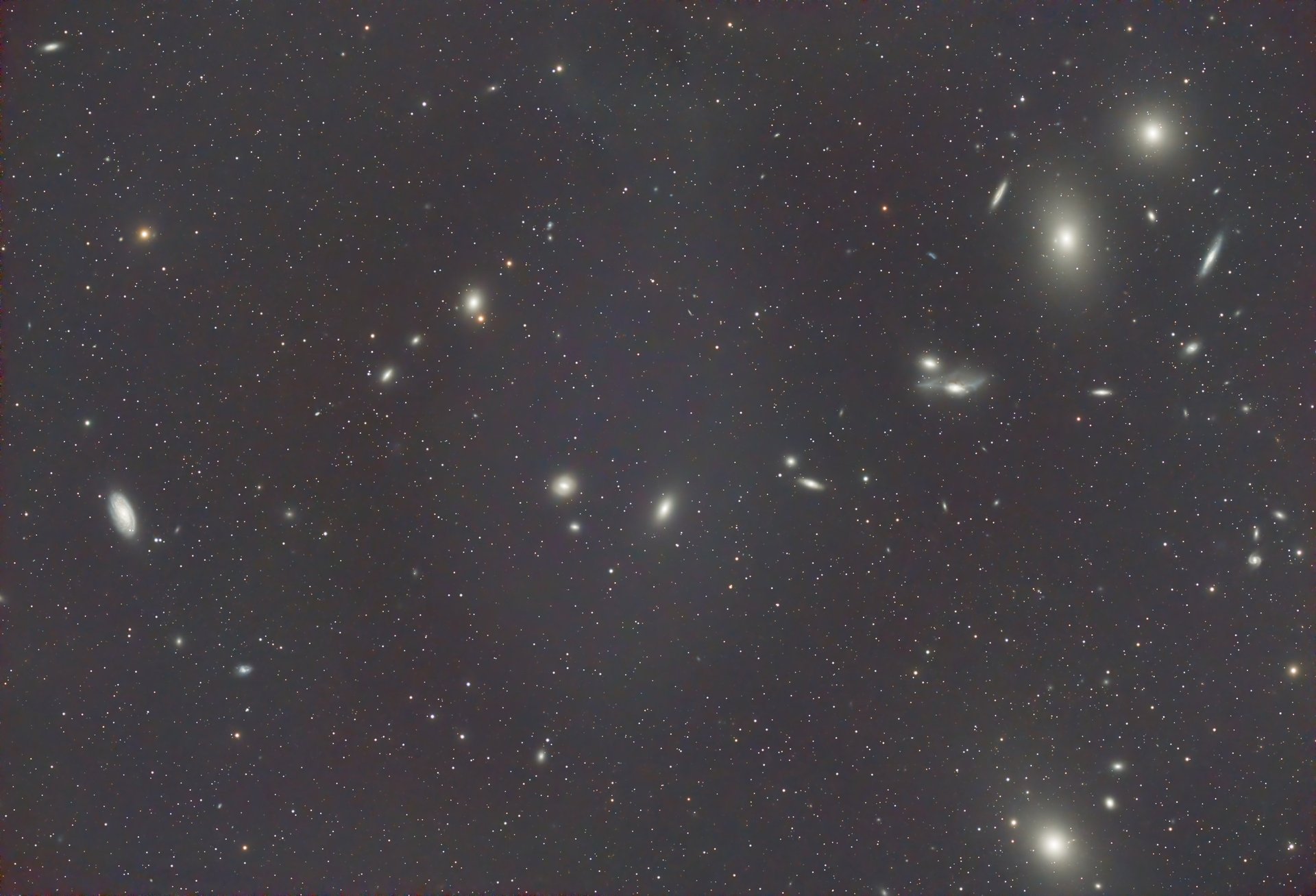 an abstract photo of a curved building with a blue sky in the background