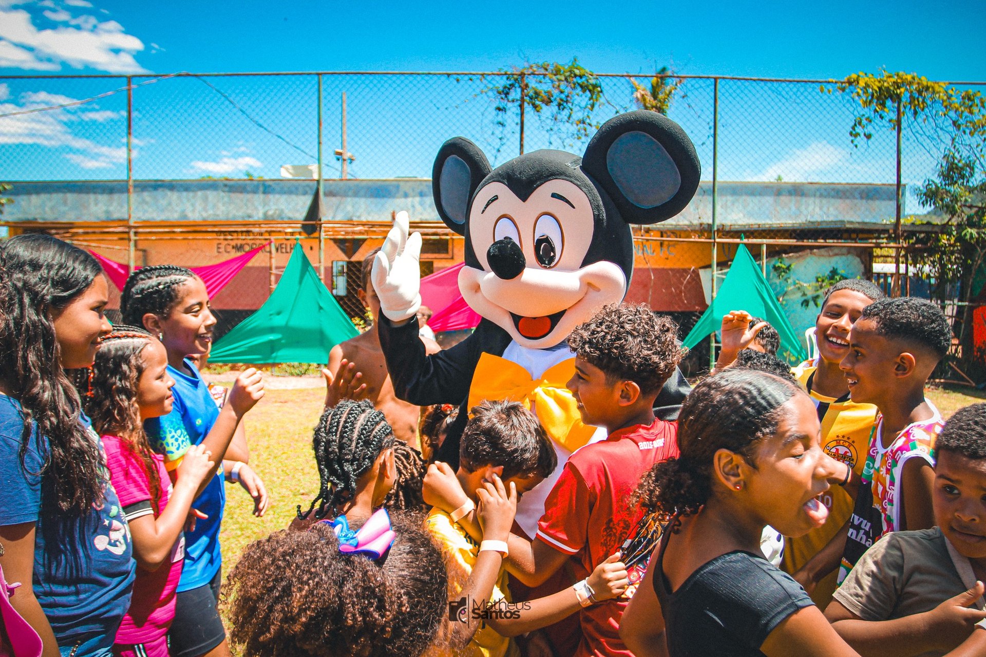 an abstract photo of a curved building with a blue sky in the background