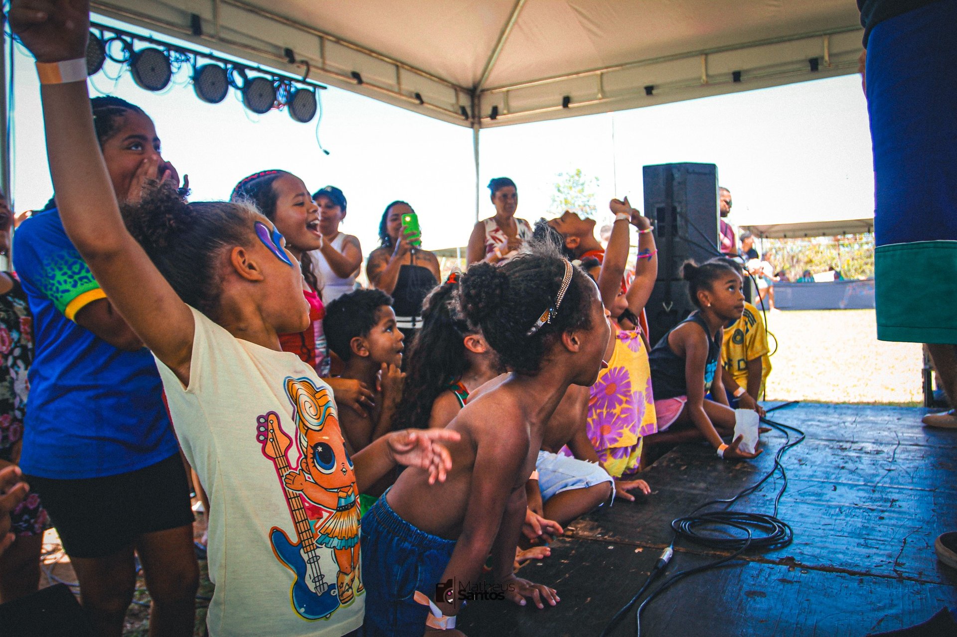 an abstract photo of a curved building with a blue sky in the background