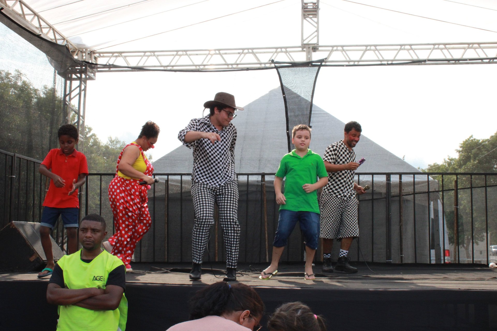 an abstract photo of a curved building with a blue sky in the background