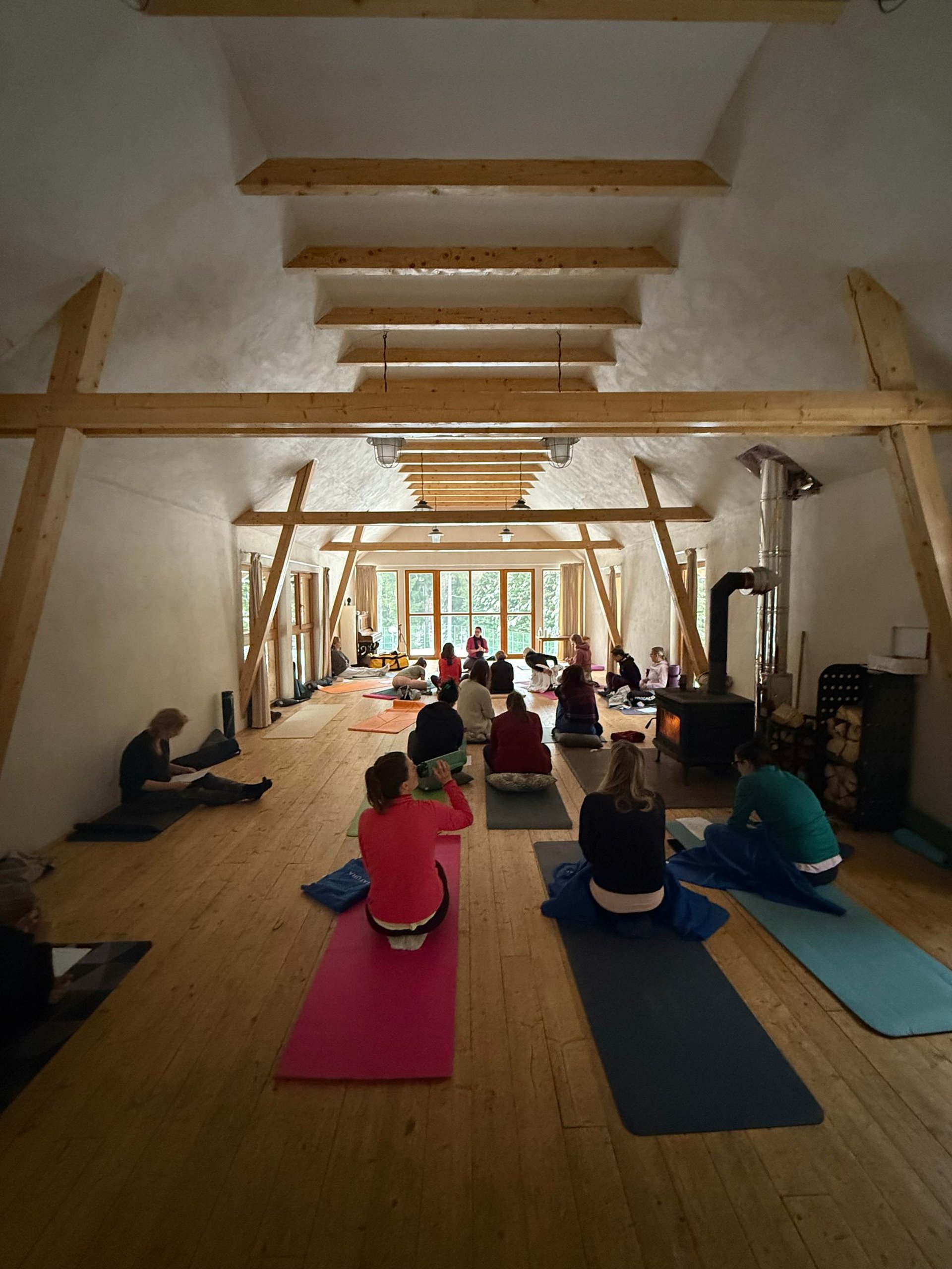 an abstract photo of a curved building with a blue sky in the background