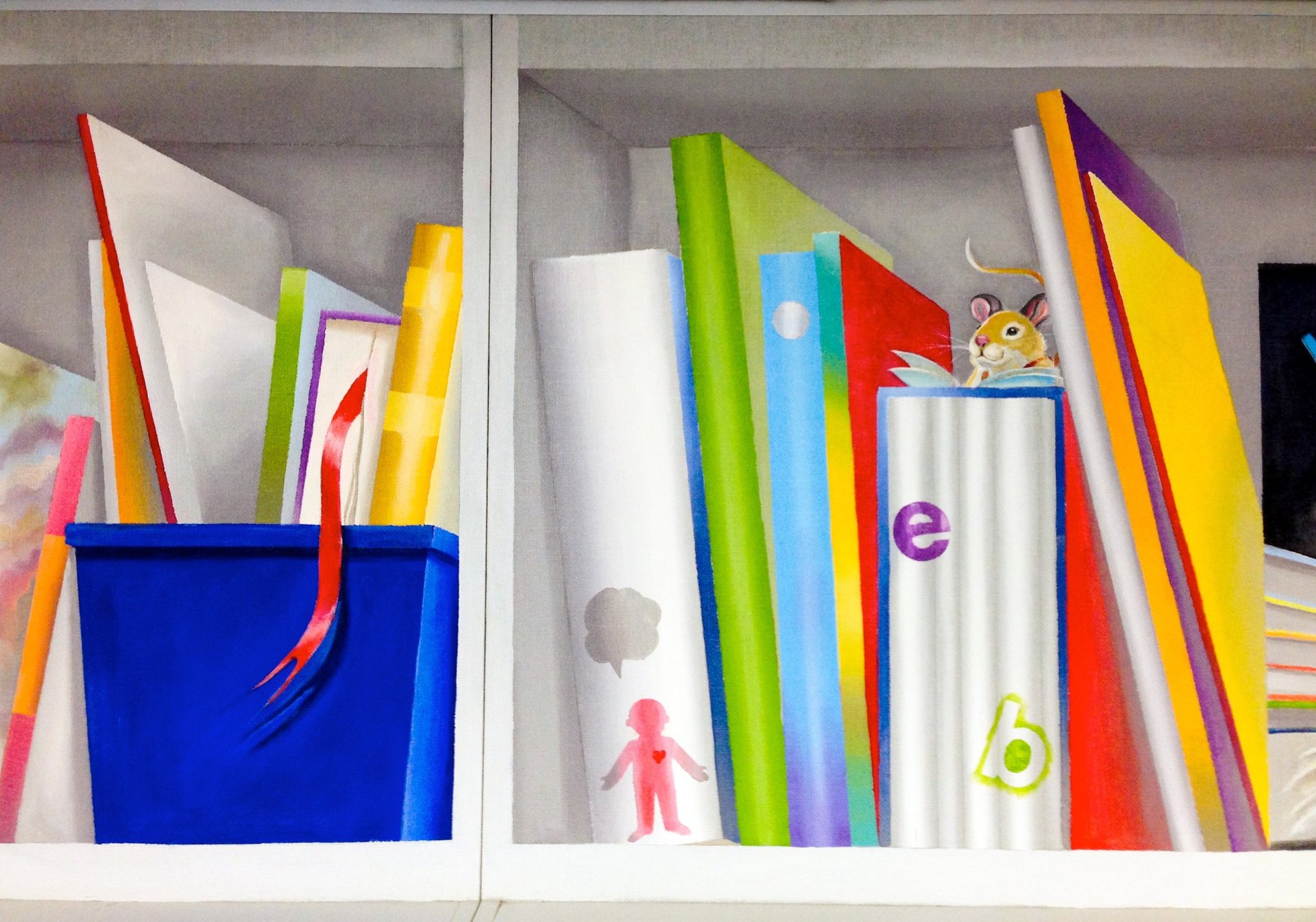 Segment of hand-painted children's book shelf mural depicting a bright blue box, books and a reading mouse.