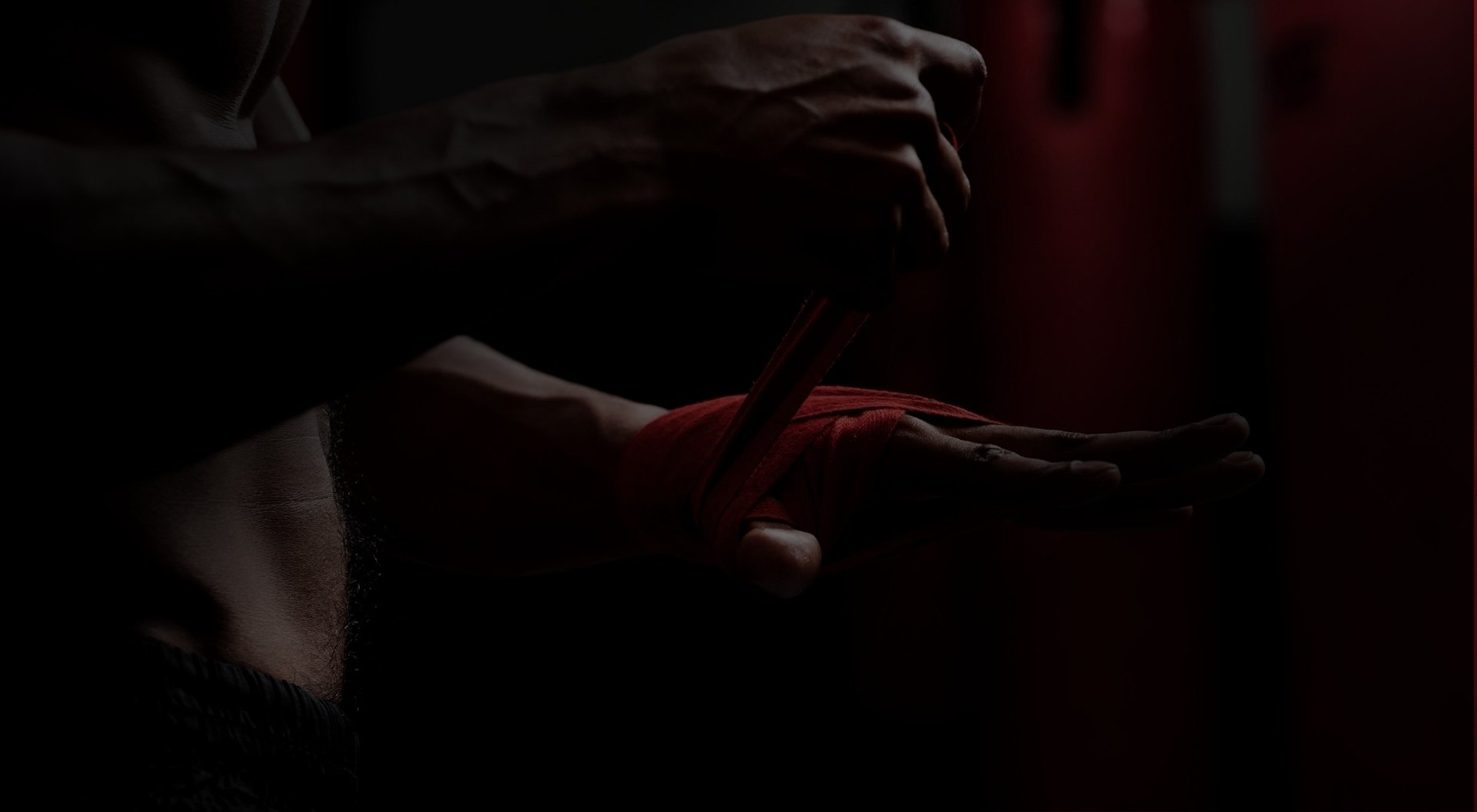 an abstract photo of a curved building with a blue sky in the background