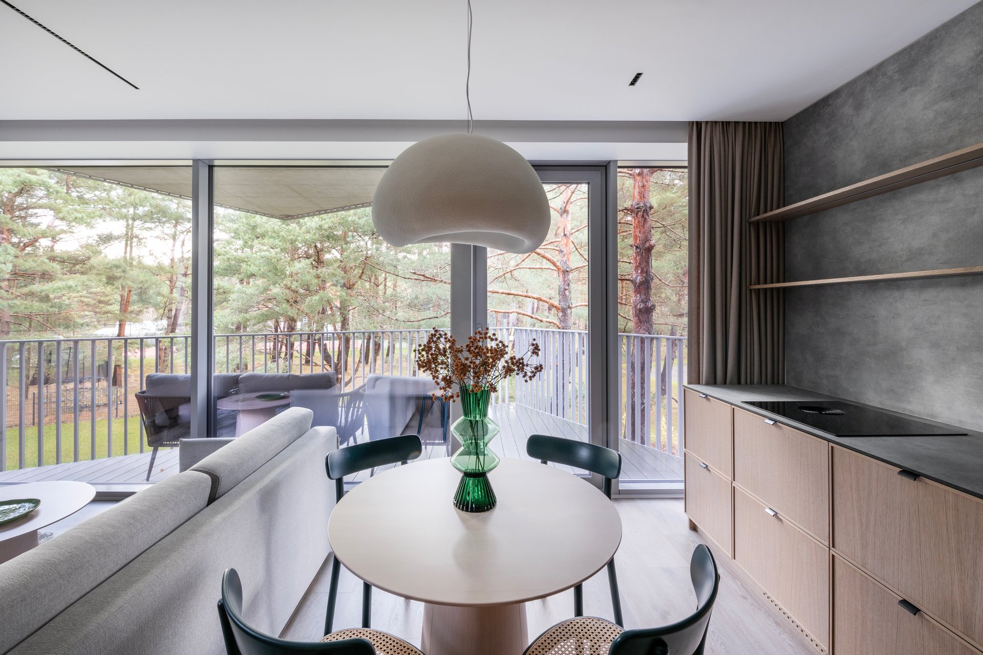 an abstract photo of a curved building with a blue sky in the background