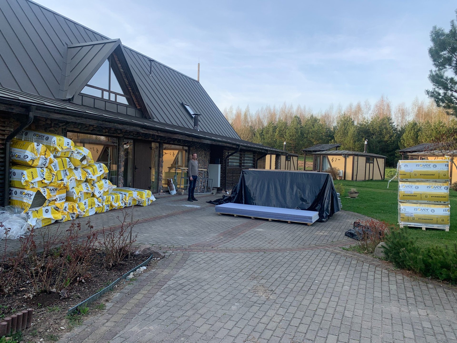 woman wearing yellow long-sleeved dress under white clouds and blue sky during daytime