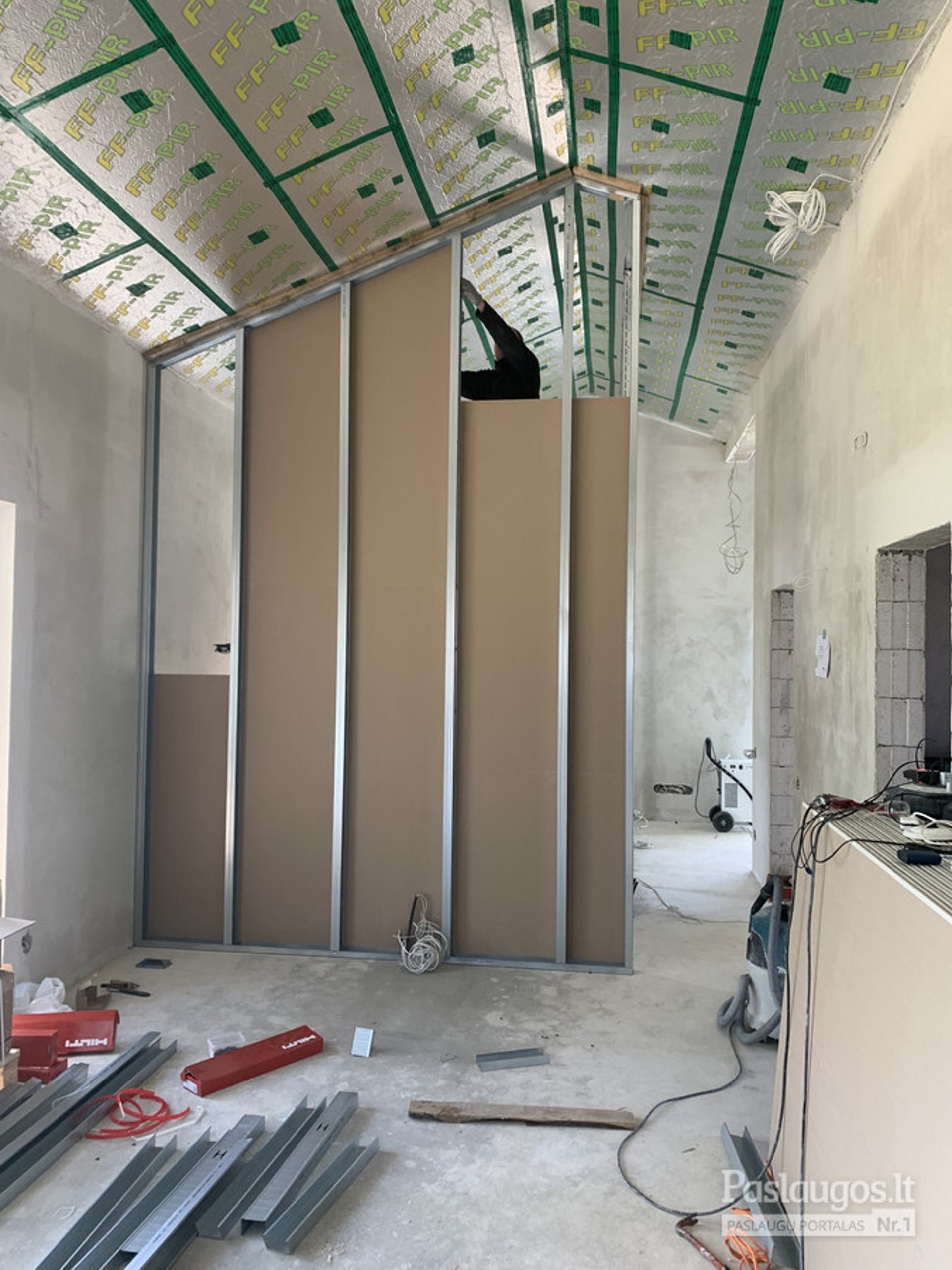an abstract photo of a curved building with a blue sky in the background