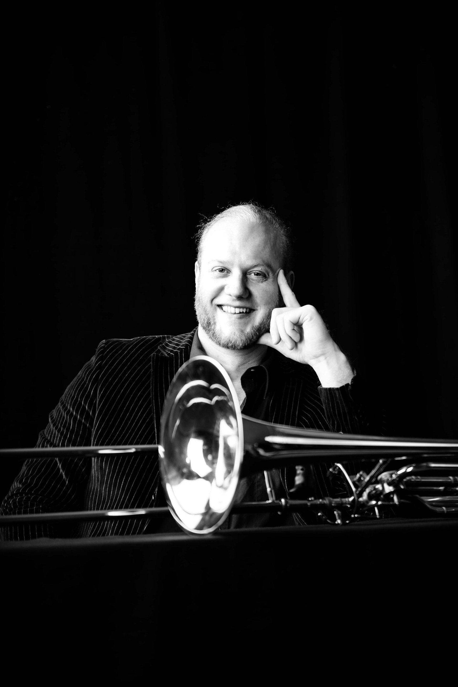black and brown leather padded tub sofa