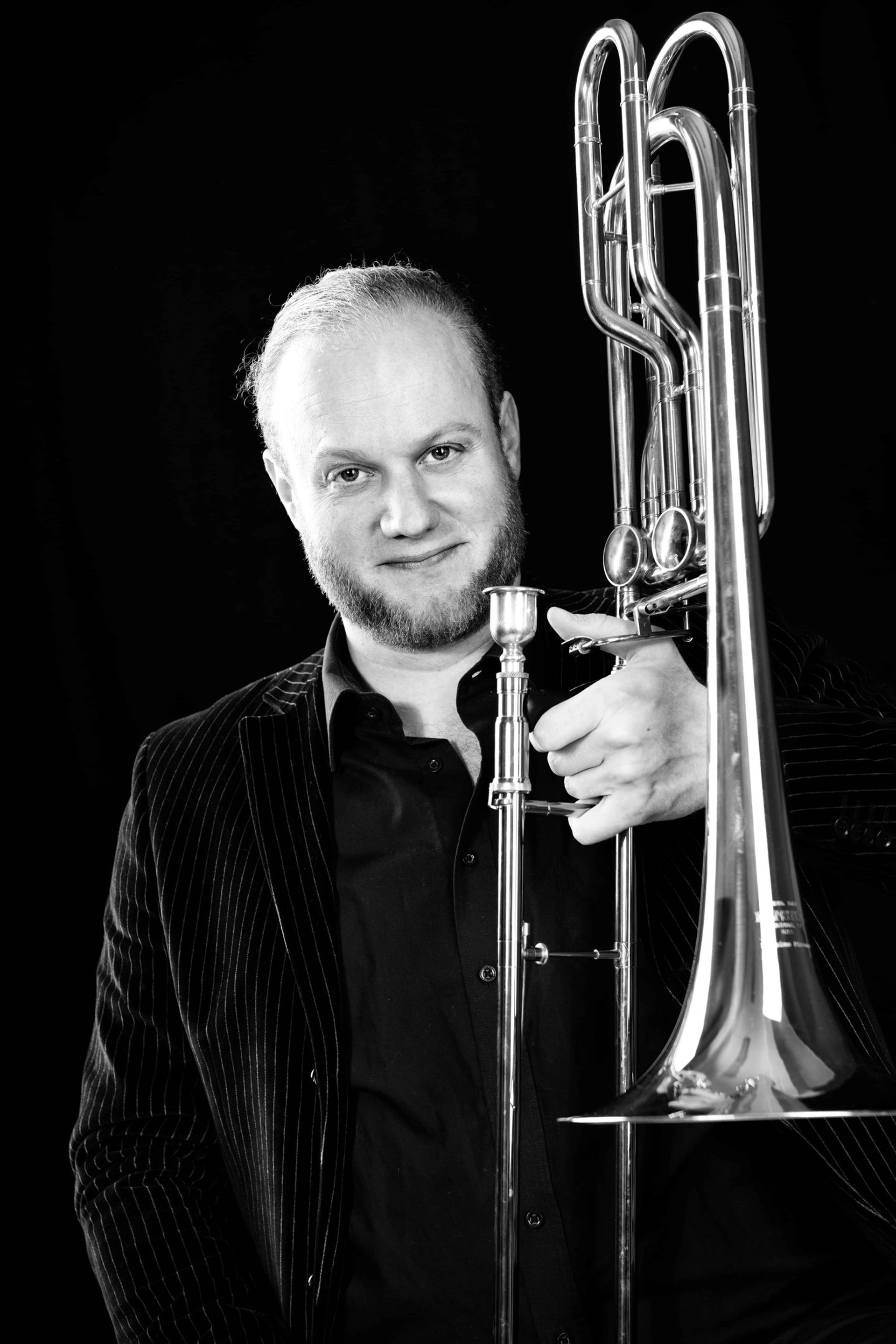 black and brown leather padded tub sofa