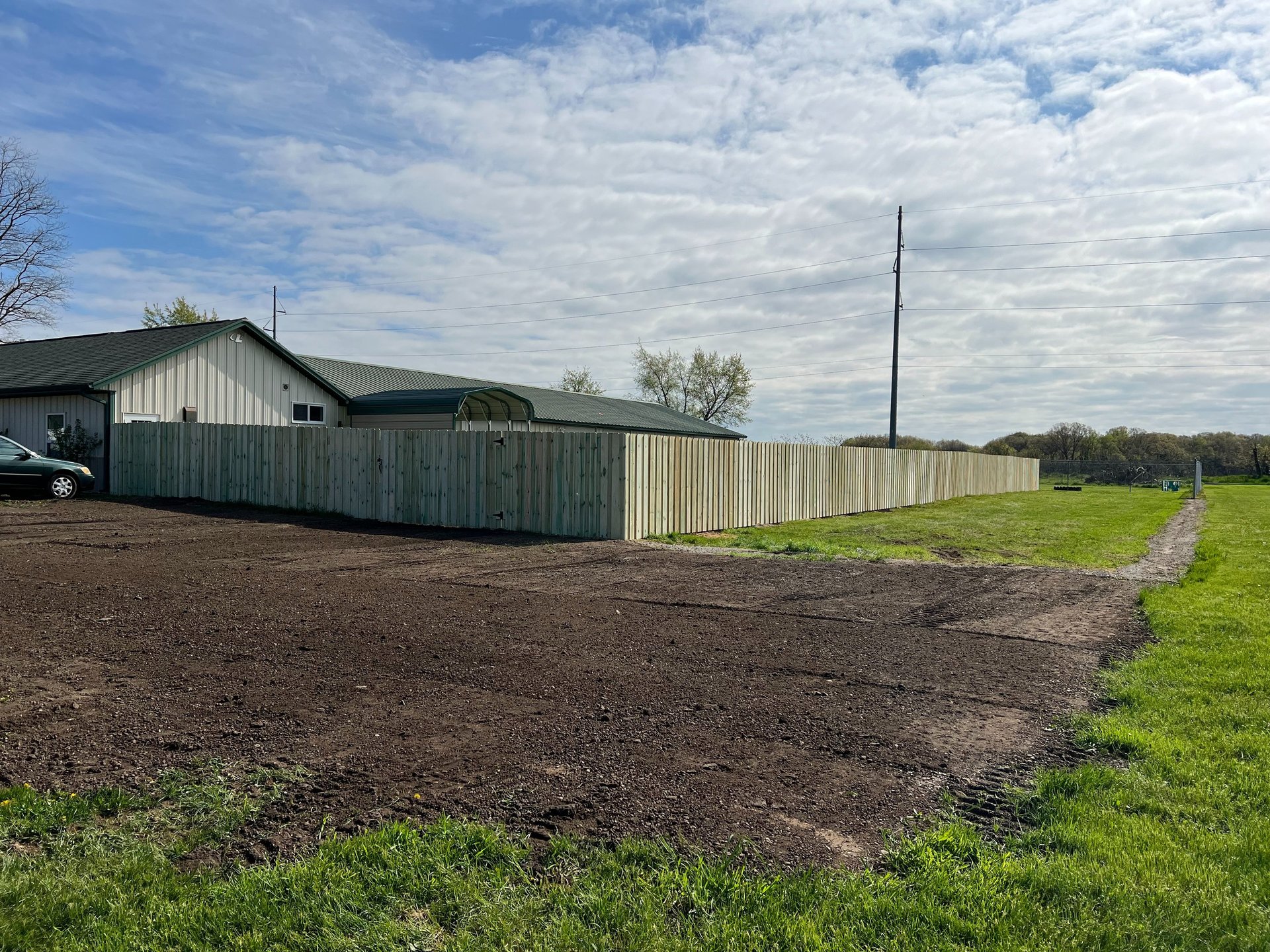 woman wearing yellow long-sleeved dress under white clouds and blue sky during daytime