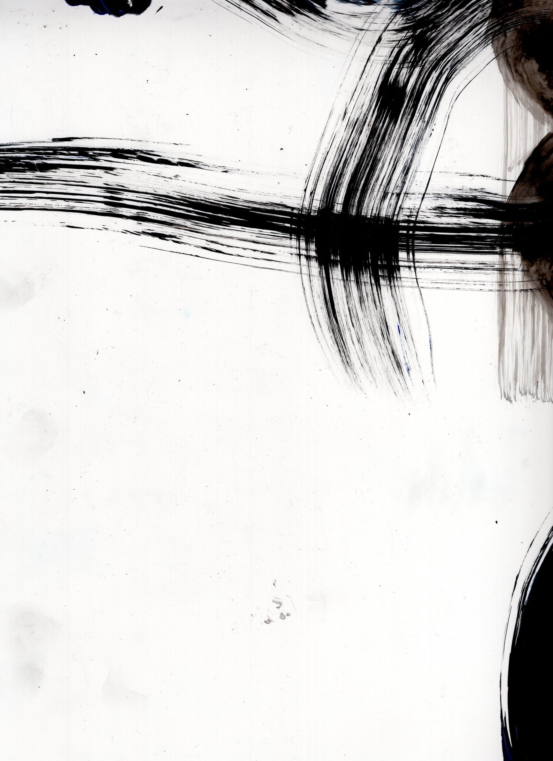 an abstract photo of a curved building with a blue sky in the background