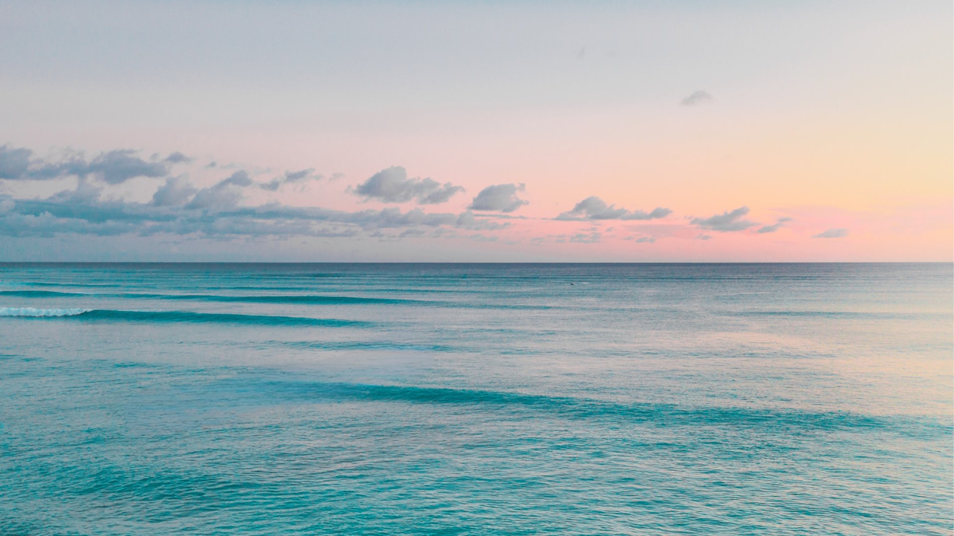 woman wearing yellow long-sleeved dress under white clouds and blue sky during daytime