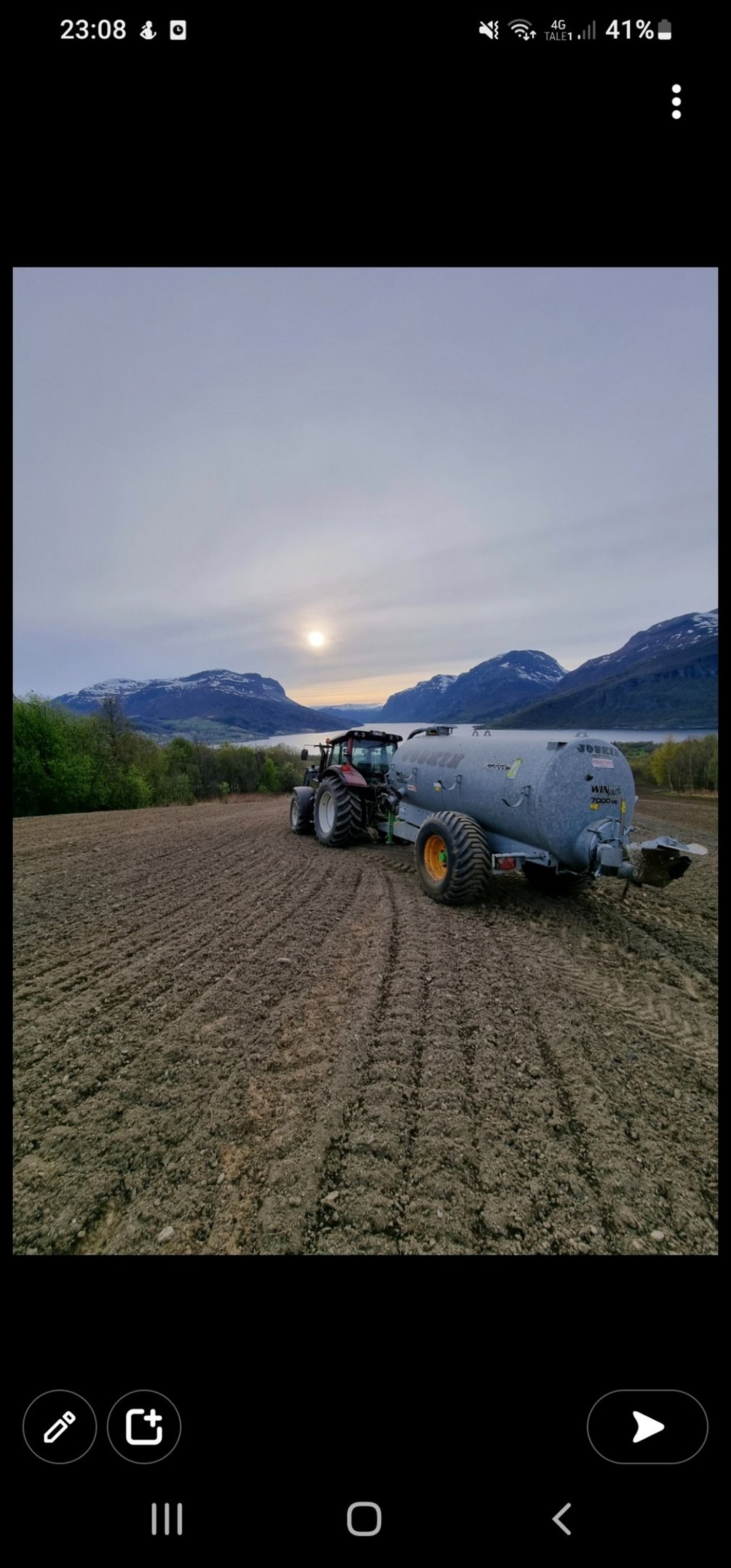 an abstract photo of a curved building with a blue sky in the background