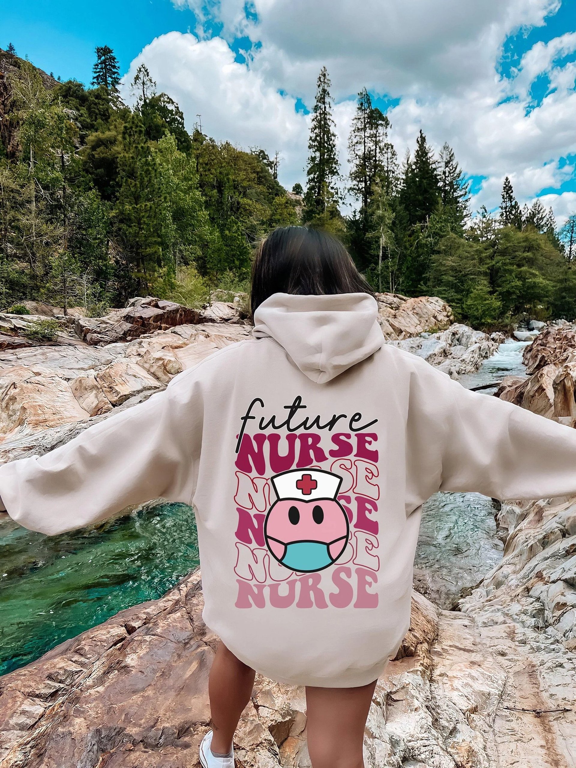 woman wearing yellow long-sleeved dress under white clouds and blue sky during daytime