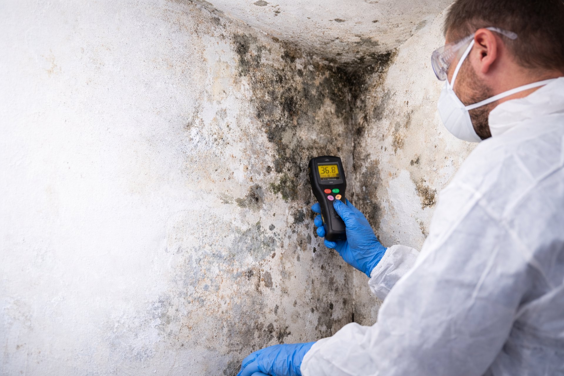 white pillar candle on silver holder