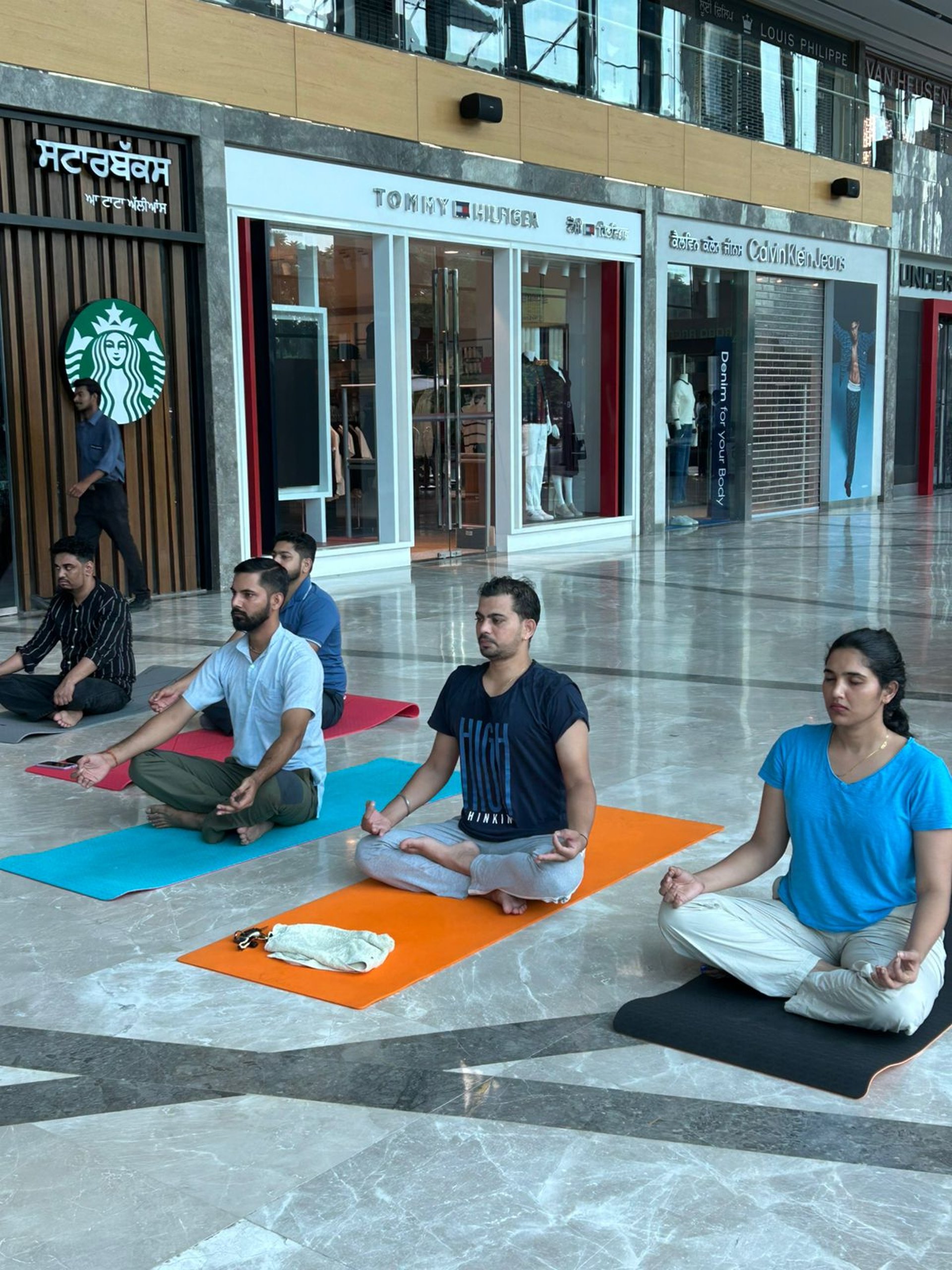 black and brown leather padded tub sofa