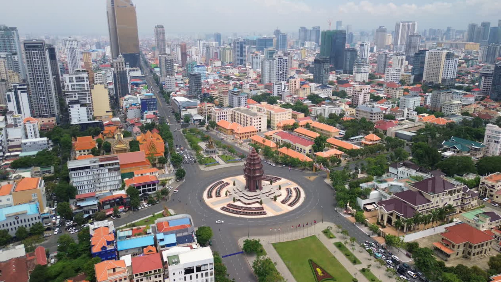 an abstract photo of a curved building with a blue sky in the background