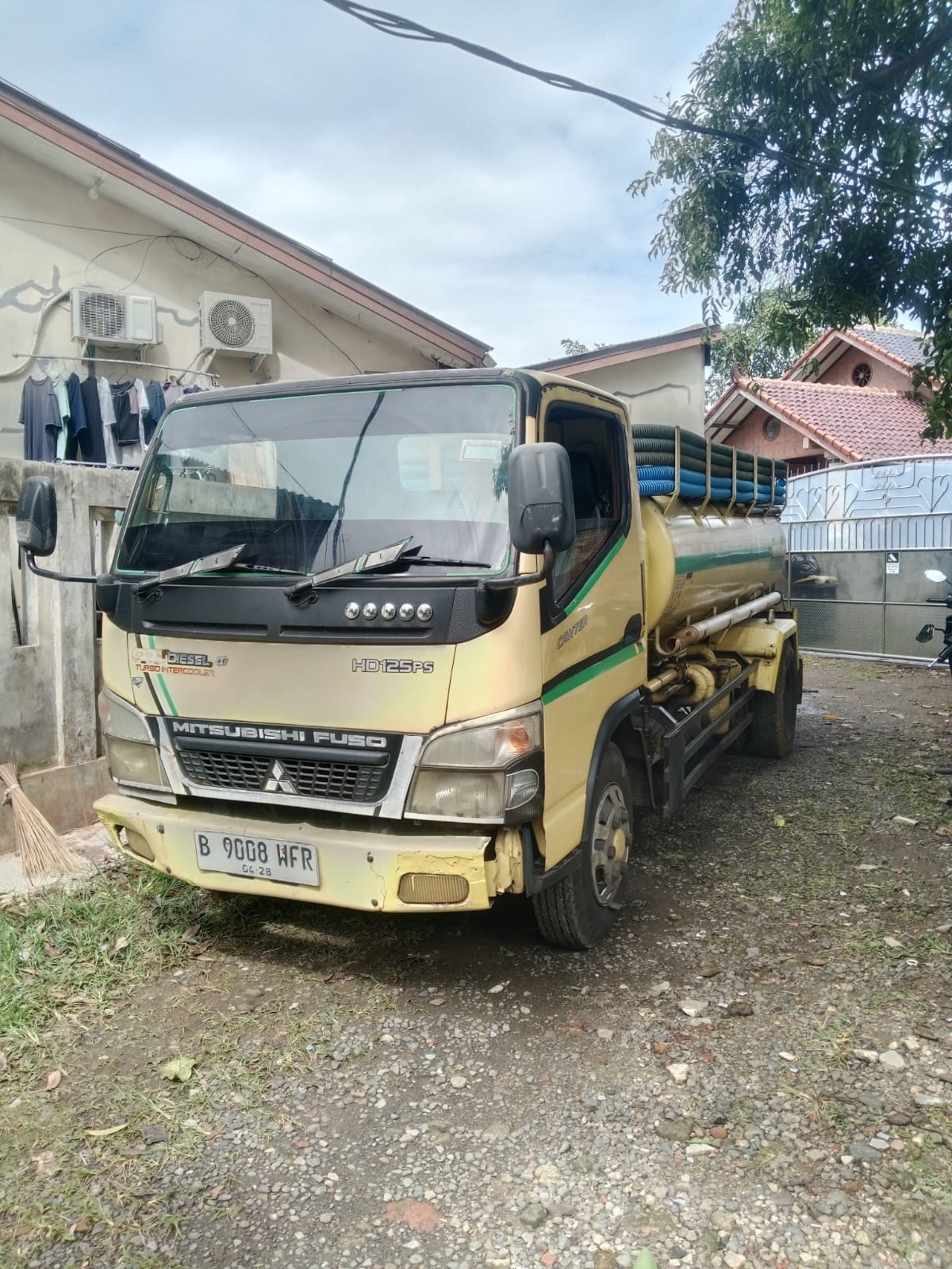 black and brown leather padded tub sofa