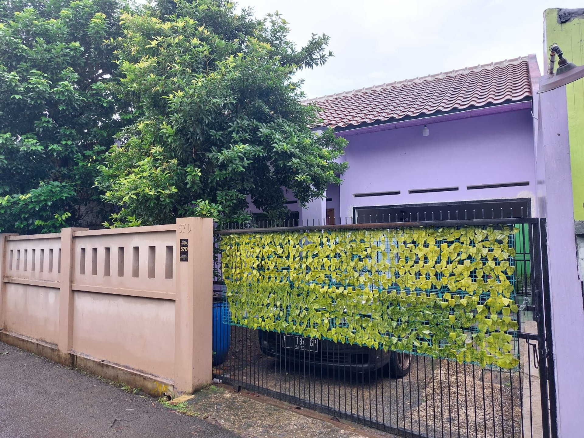 black and brown leather padded tub sofa