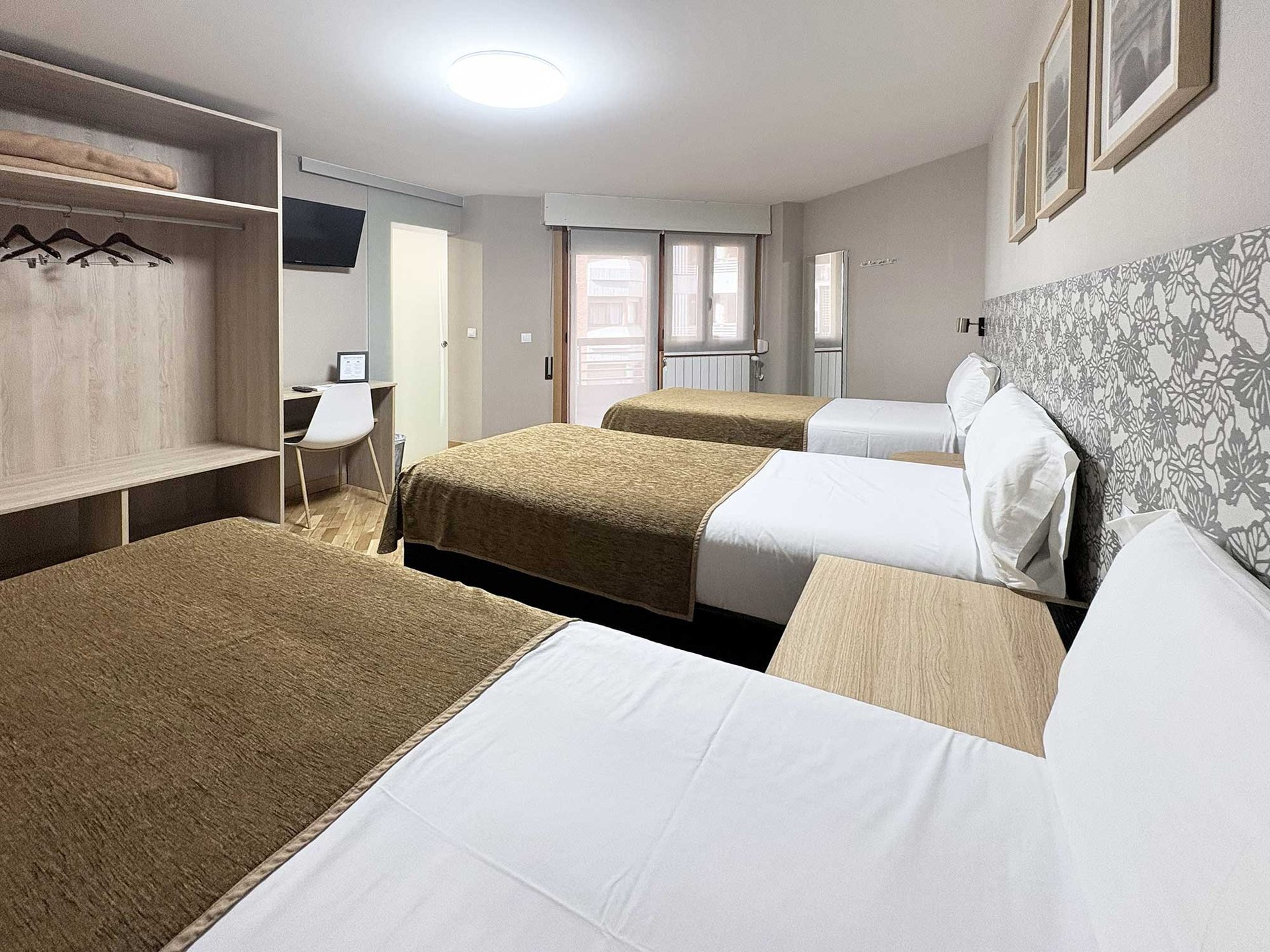 an abstract photo of a curved building with a blue sky in the background