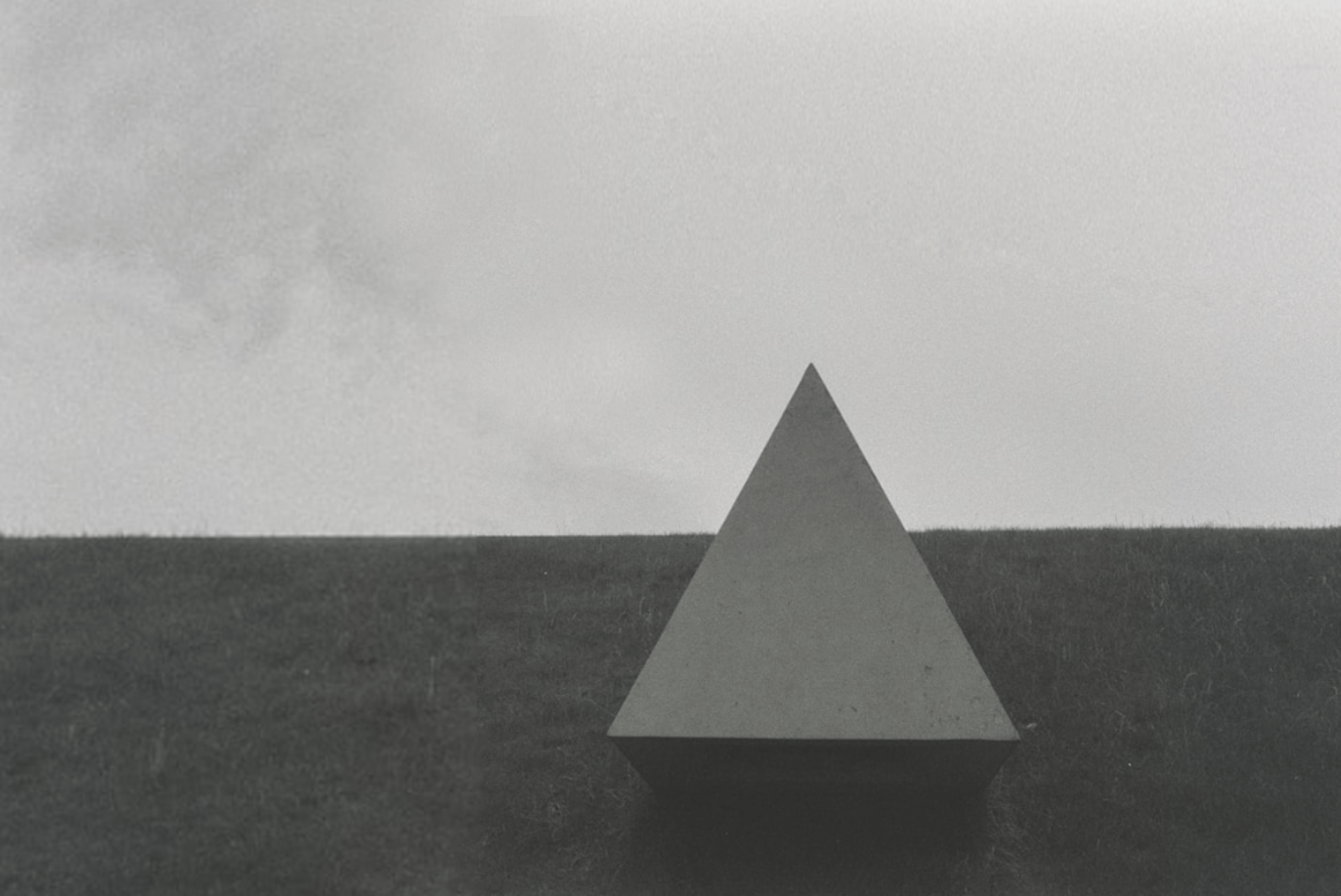 A black and white photo of a triangle