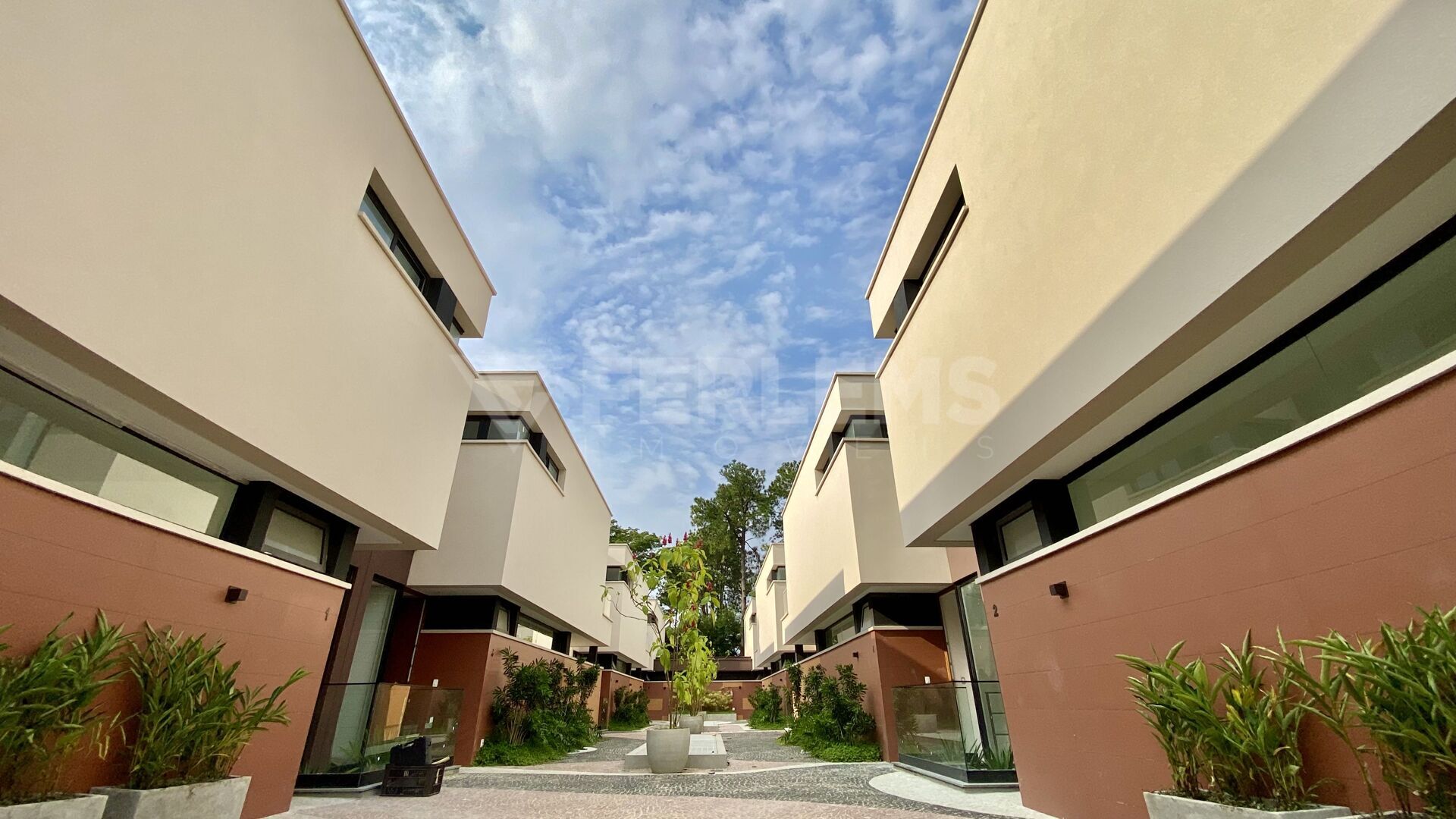black and brown leather padded tub sofa