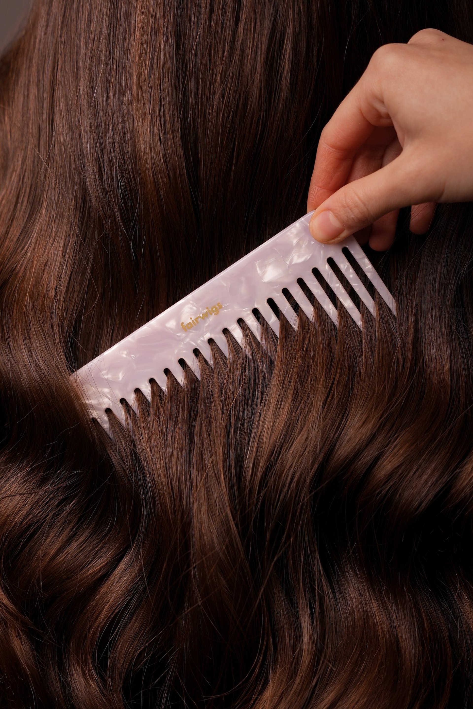 an abstract photo of a curved building with a blue sky in the background