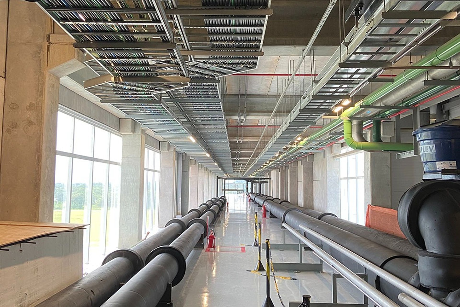 black and white building under cloudy sky