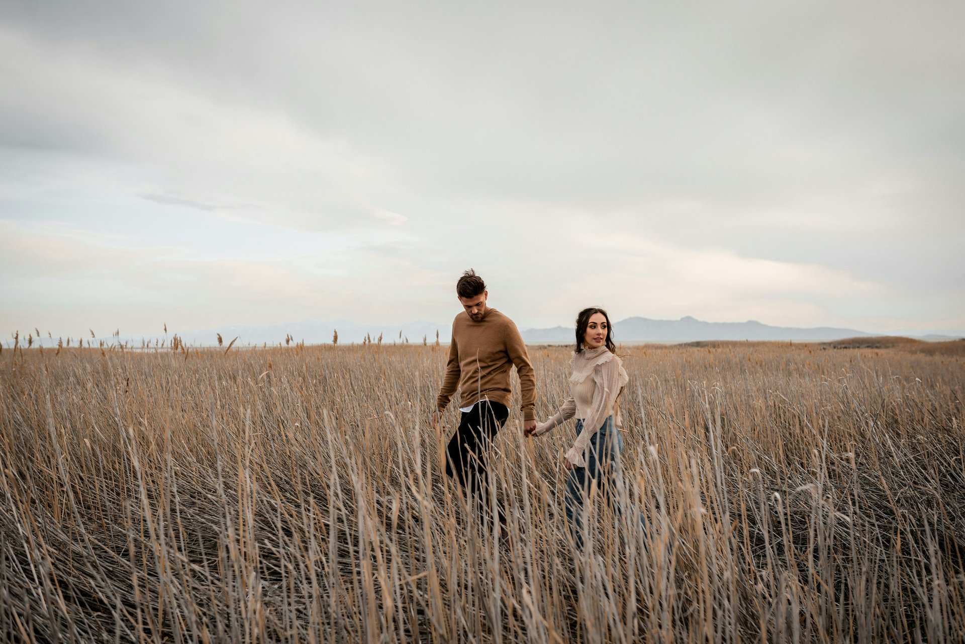 an abstract photo of a curved building with a blue sky in the background