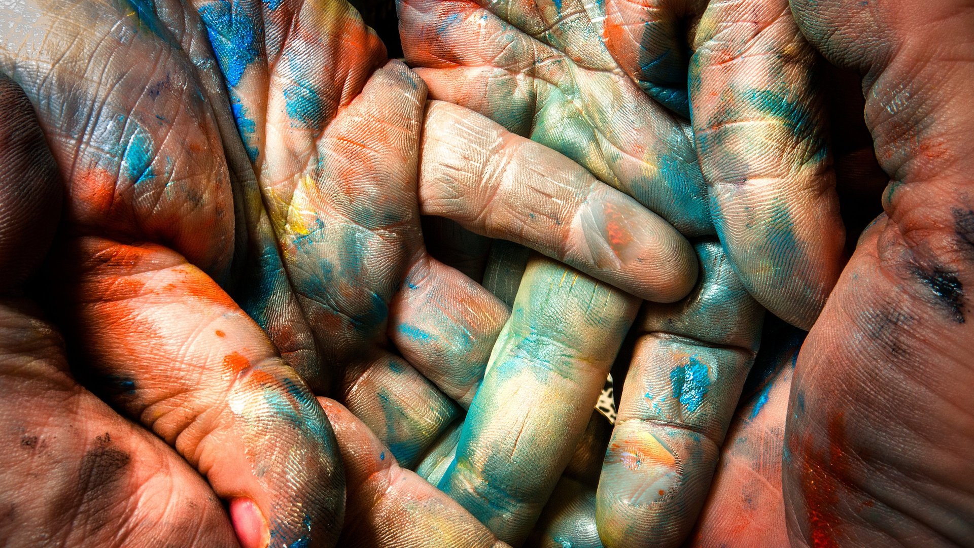 an abstract photo of a curved building with a blue sky in the background