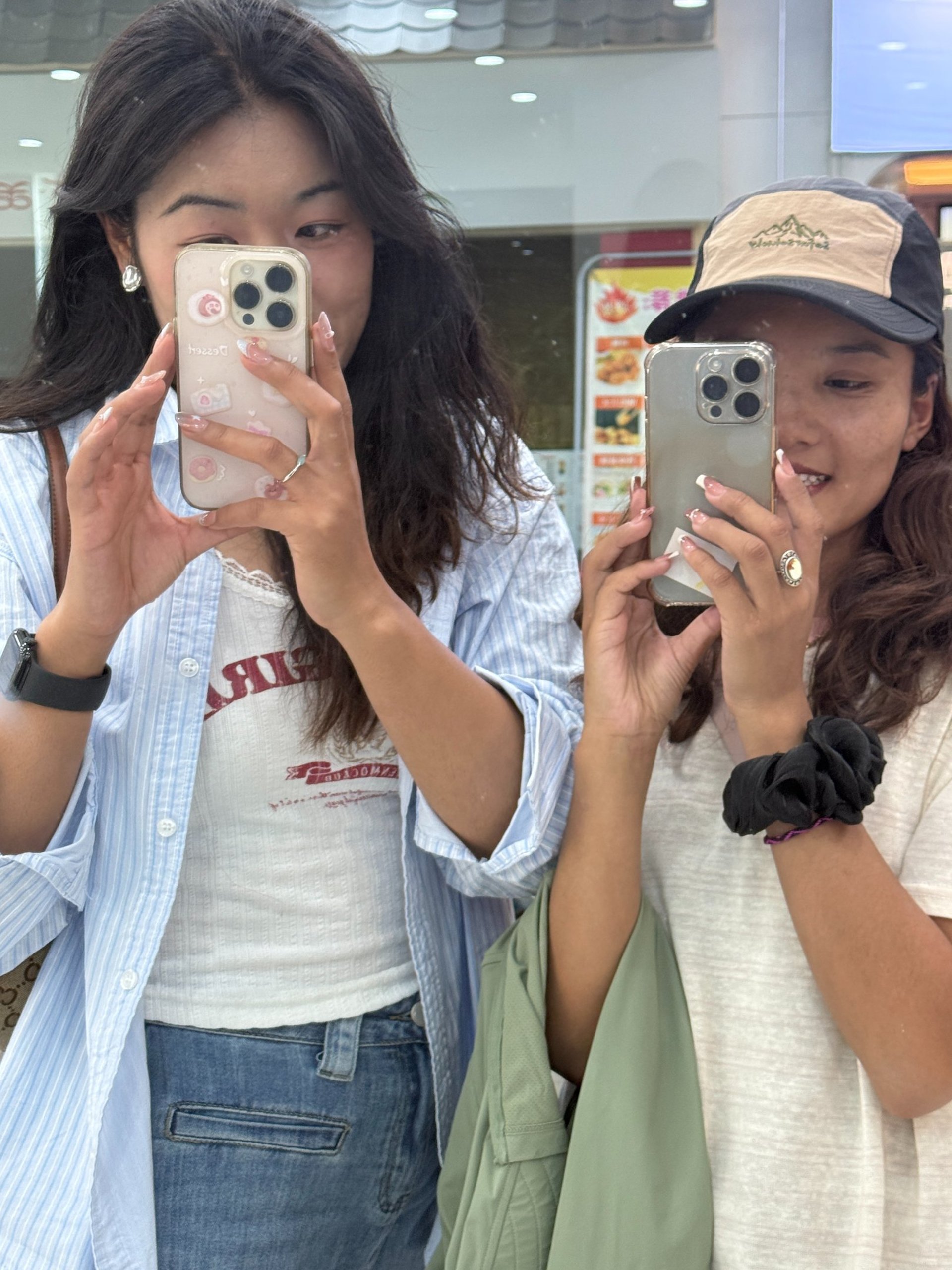 a woman in a red dress holding shopping bags