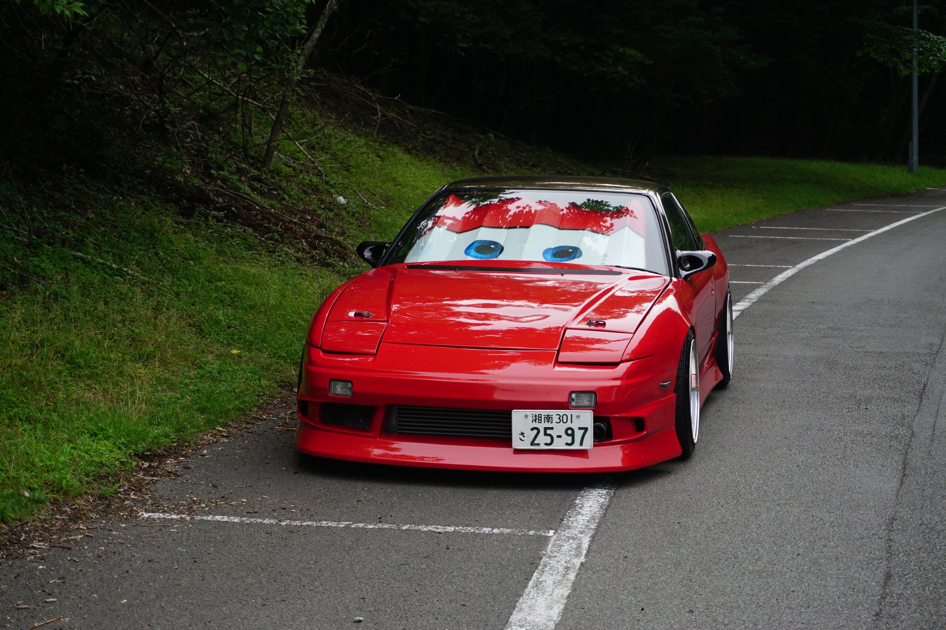 black and brown leather padded tub sofa