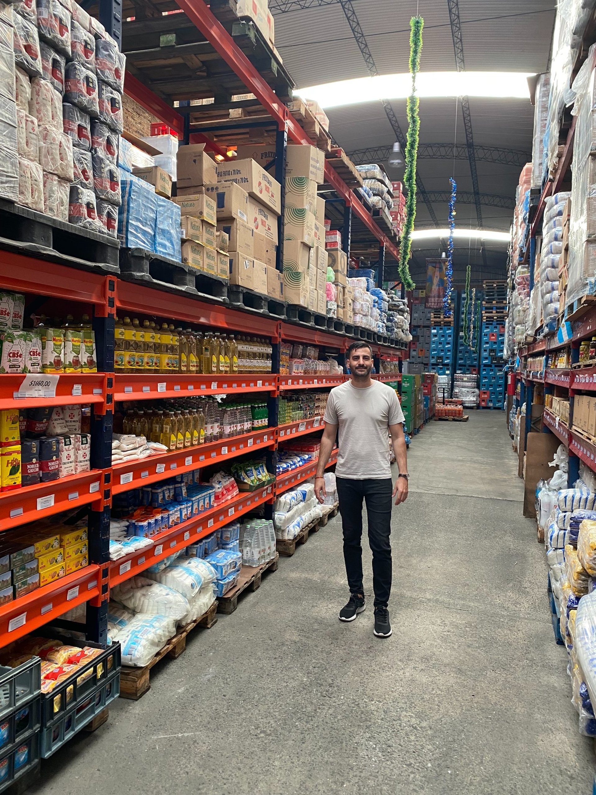person using laptop on white wooden table