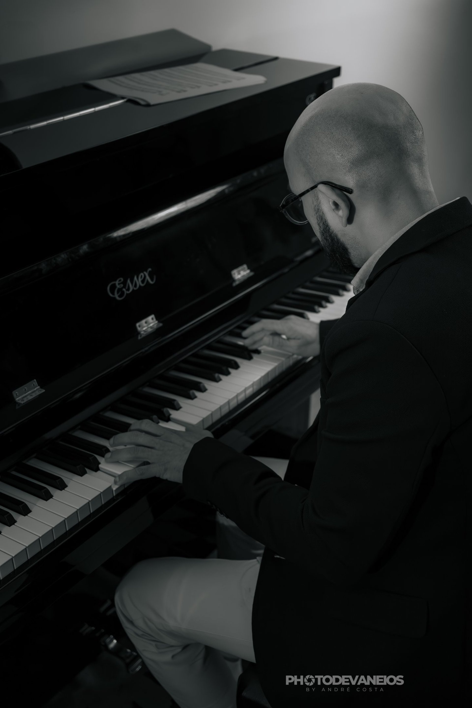 person playing black and white piano