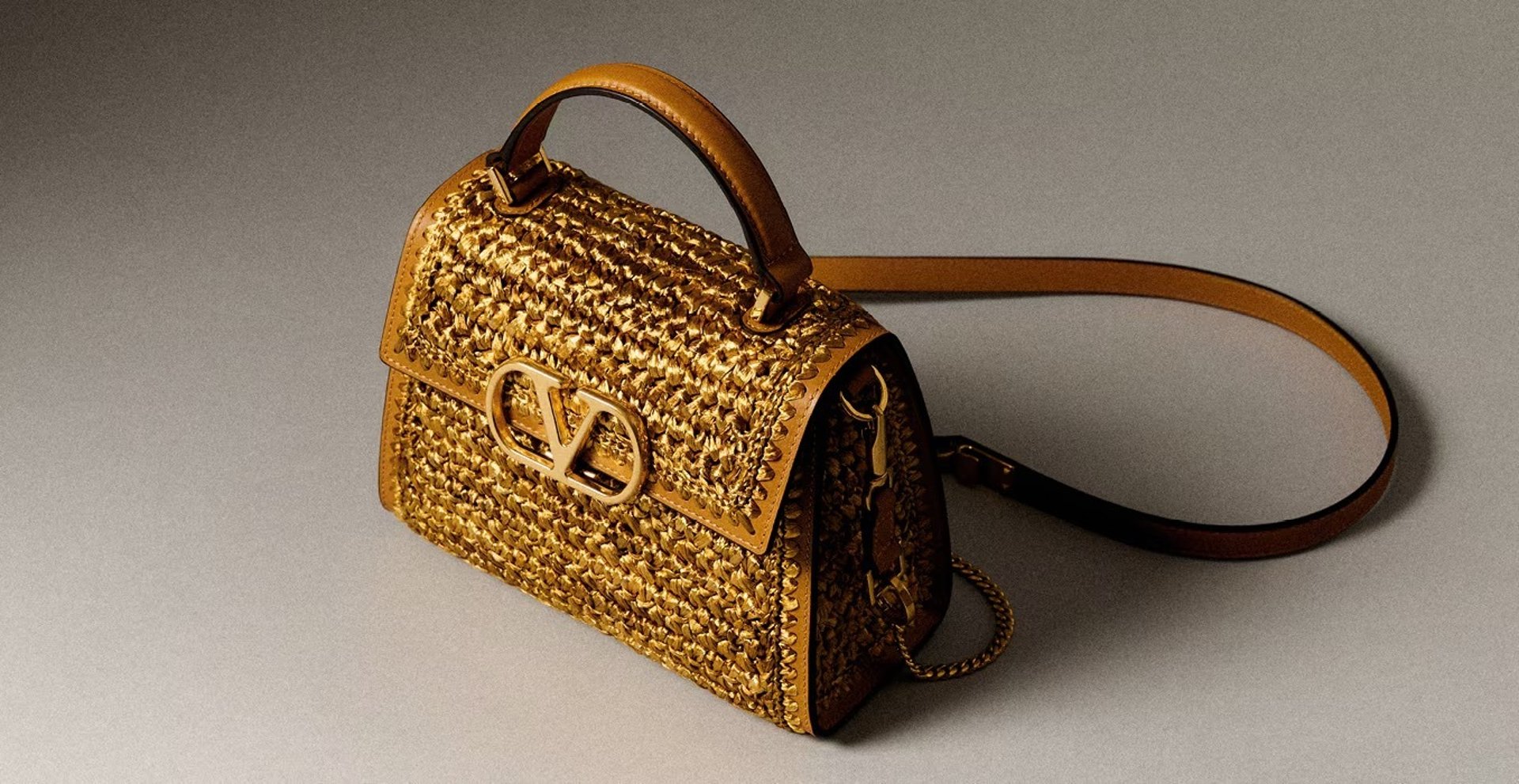 Valentino Garavani gold raffia bag. 