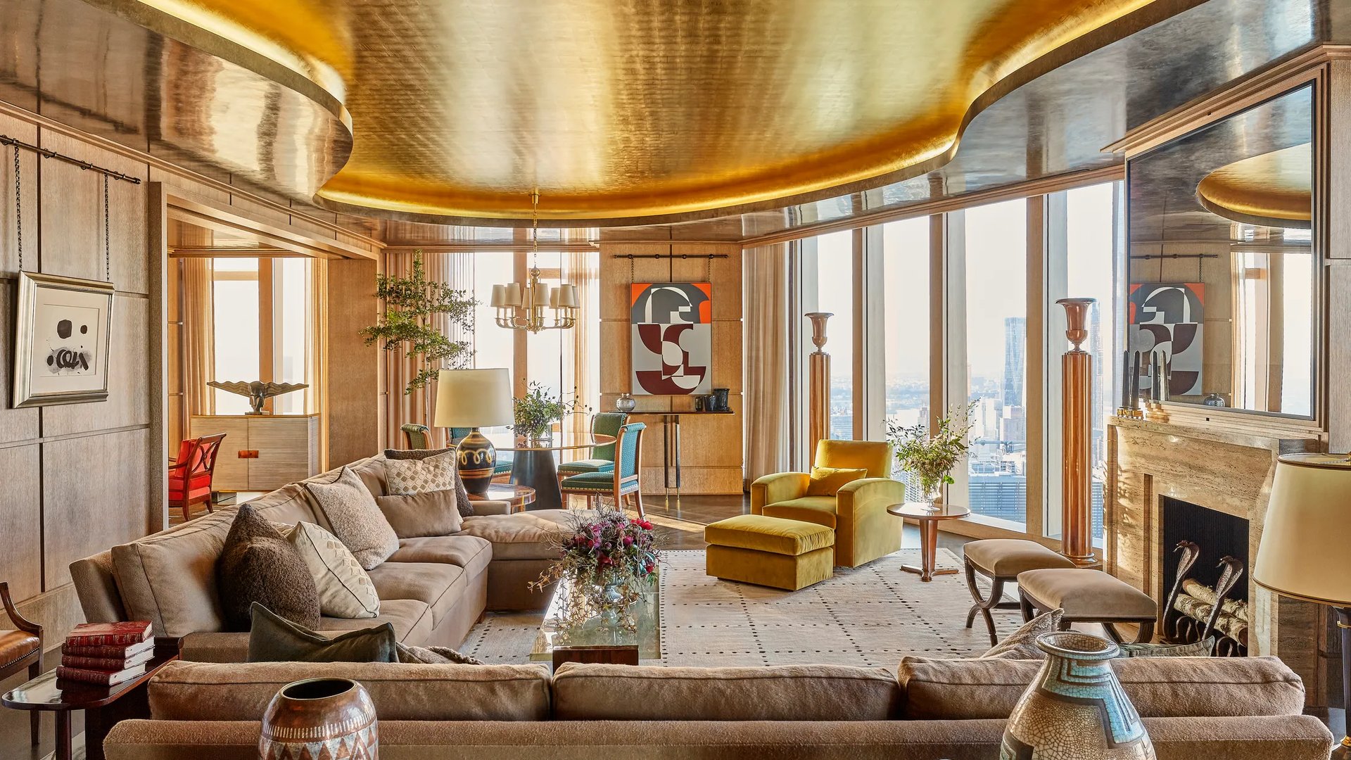Luxury penthouse interior with modern art and gold ceiling — where architecture meets fine art in design.