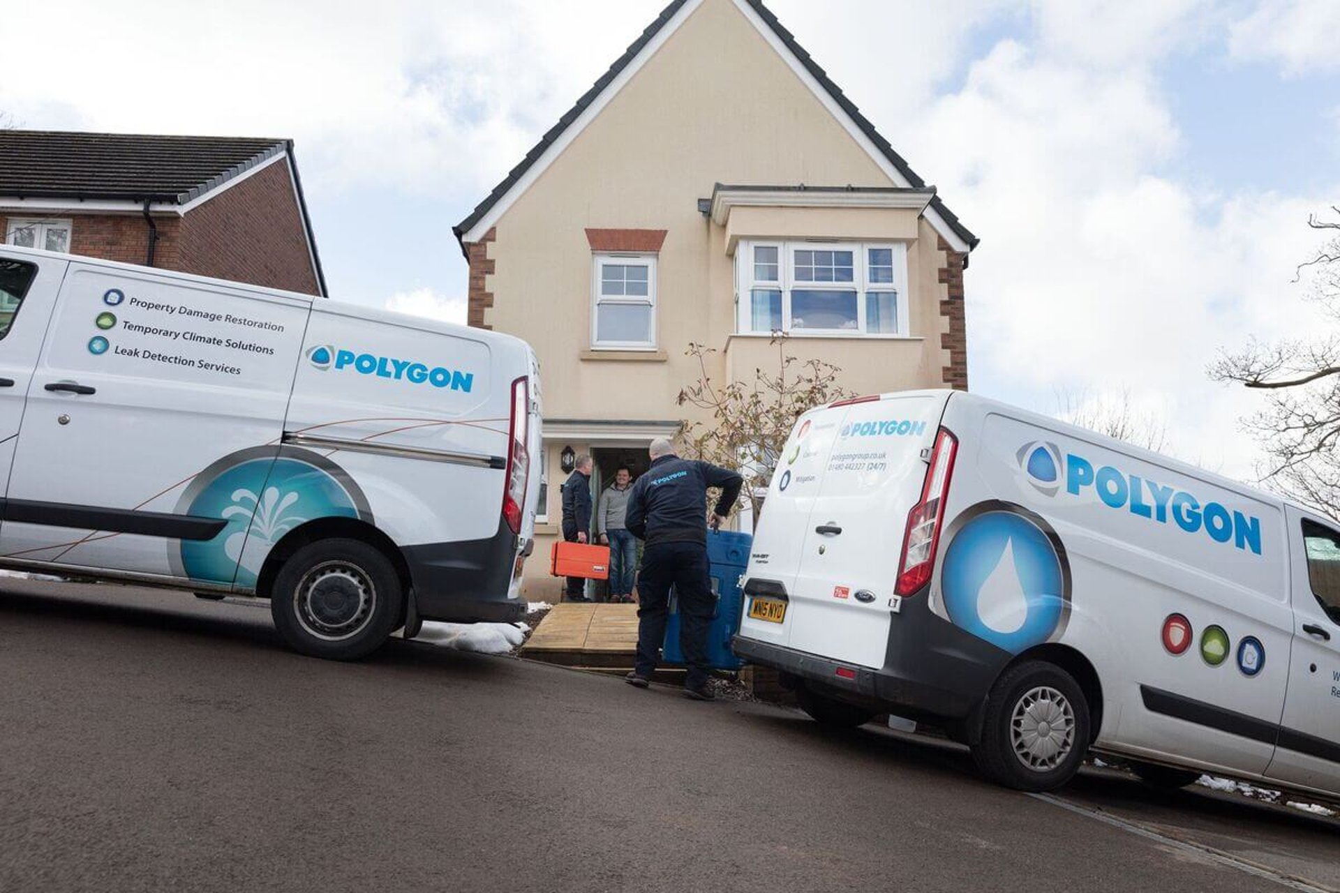 an abstract photo of a curved building with a blue sky in the background