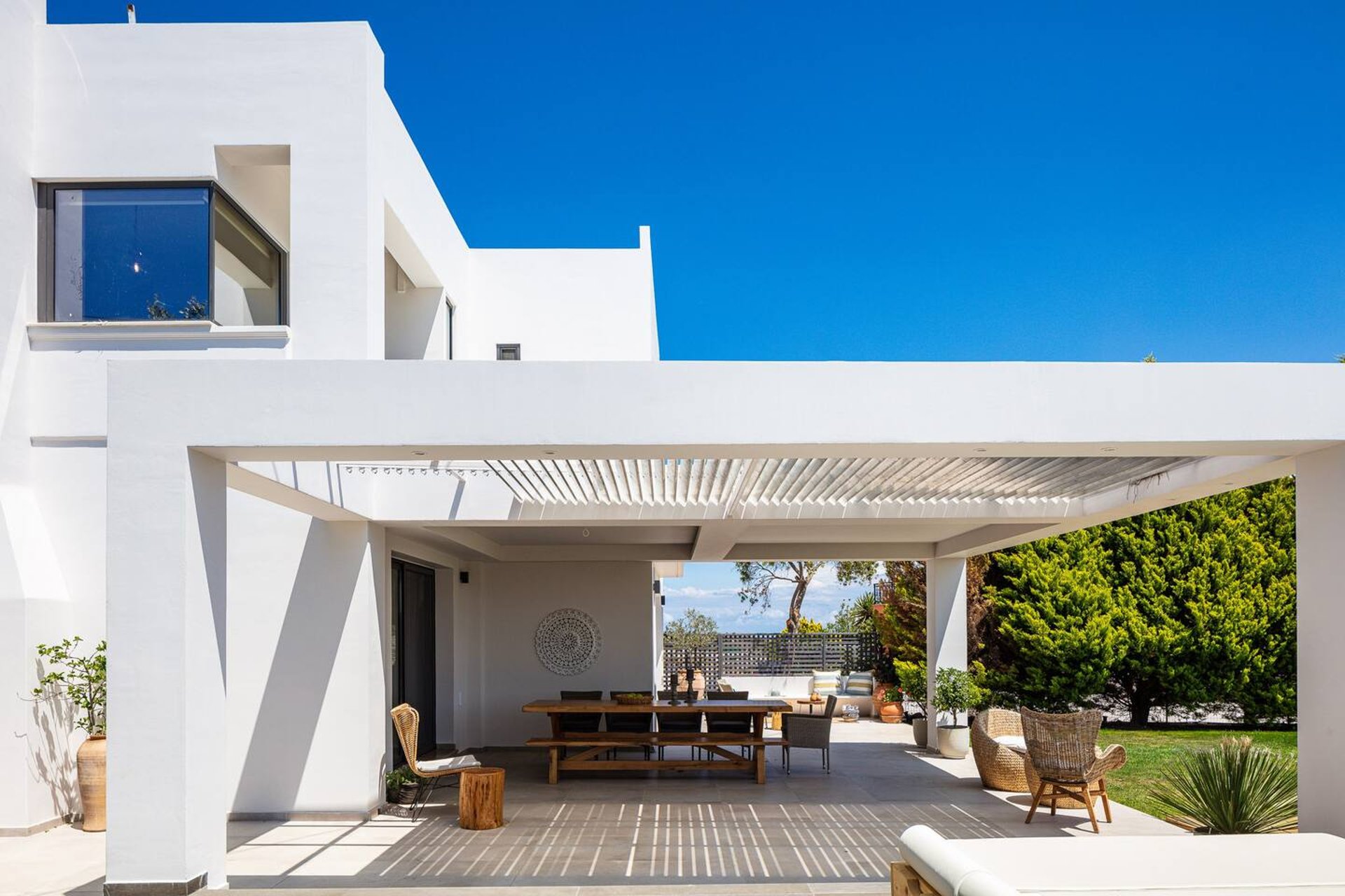 woman wearing yellow long-sleeved dress under white clouds and blue sky during daytime