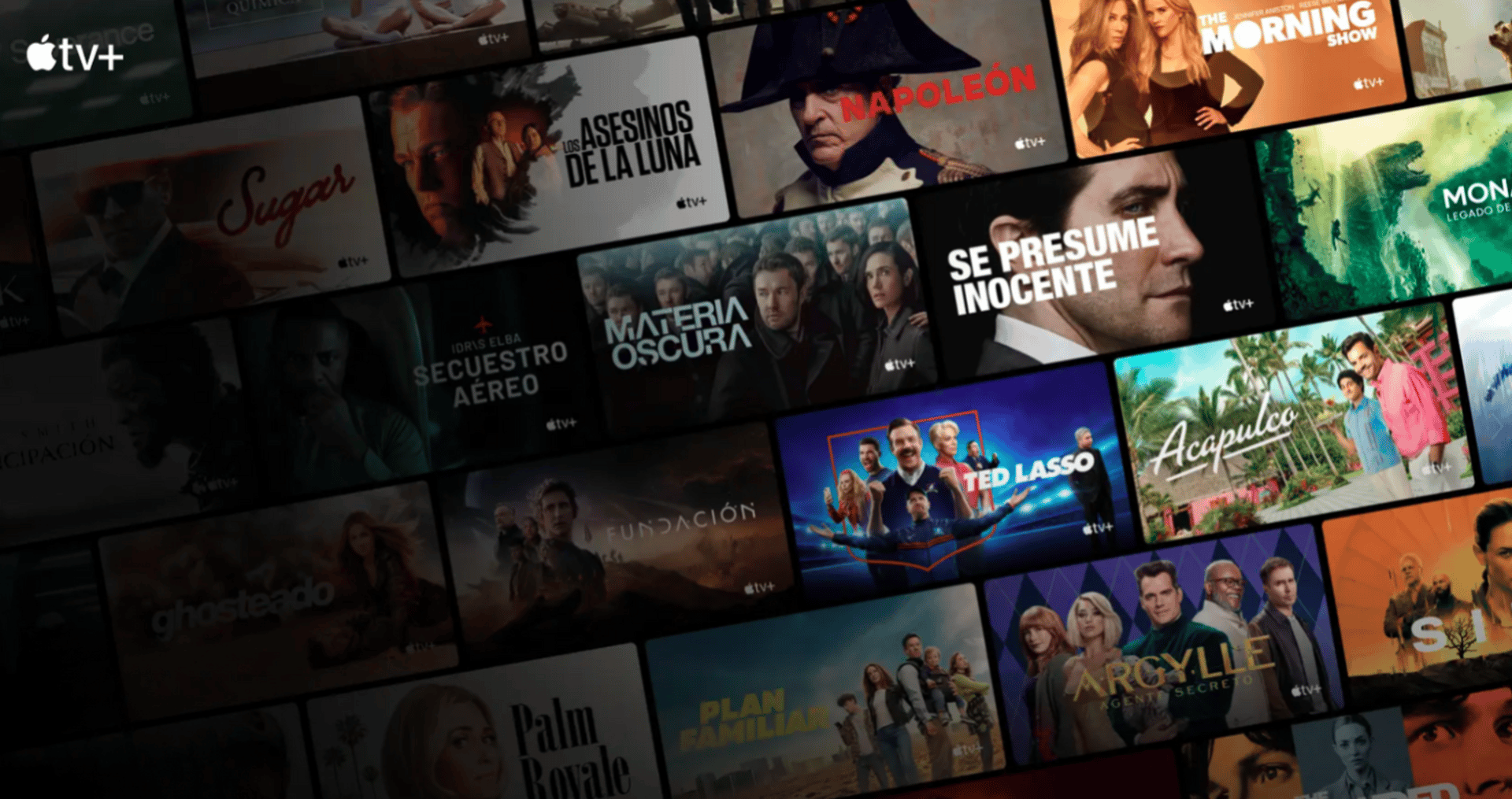 a flat screen tv sitting on top of a entertainment center