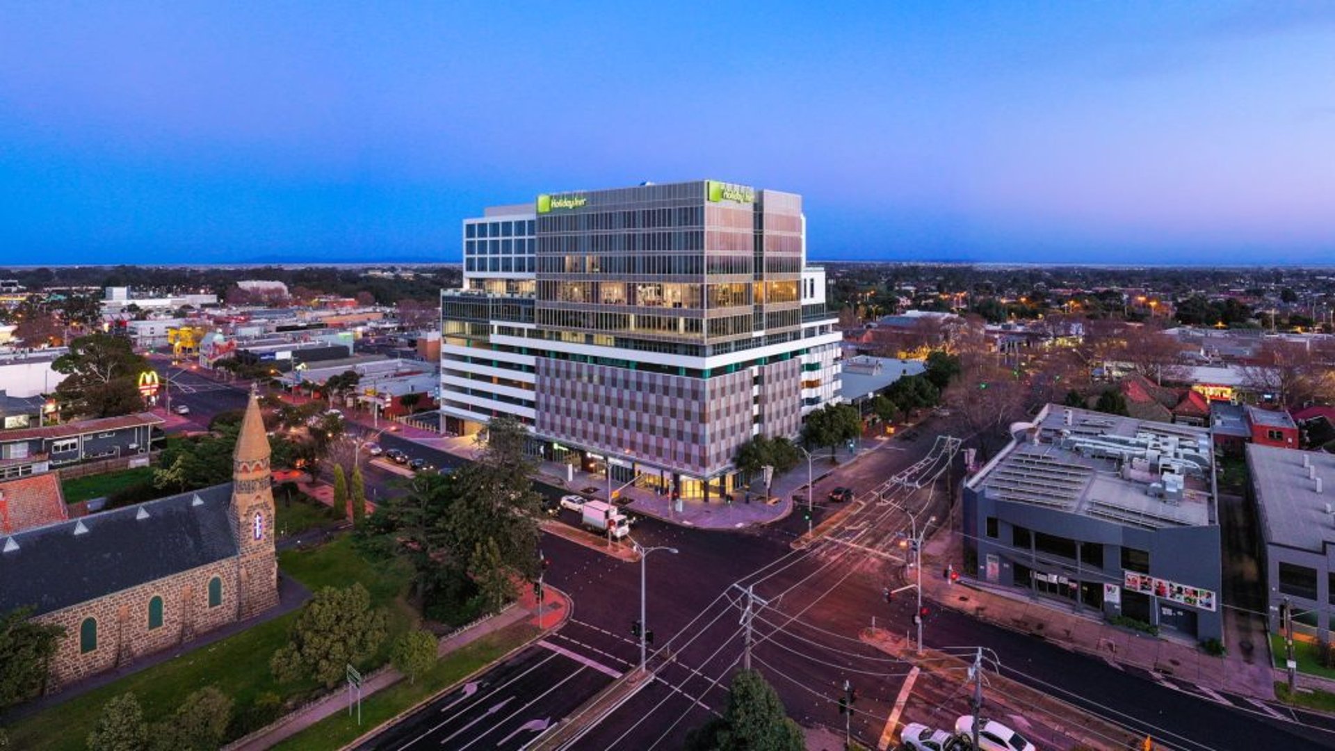 woman wearing yellow long-sleeved dress under white clouds and blue sky during daytime
