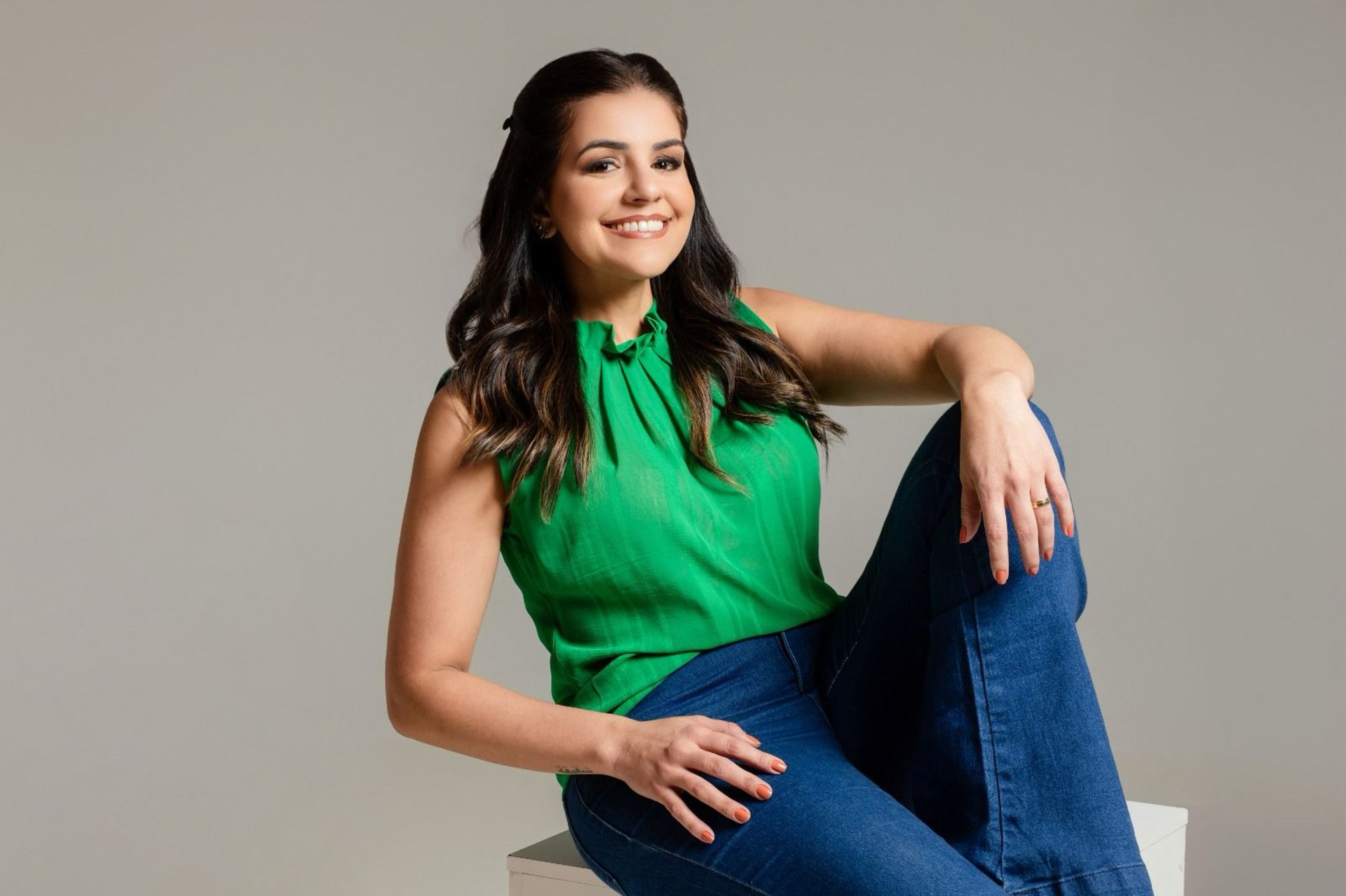 woman wearing yellow long-sleeved dress under white clouds and blue sky during daytime