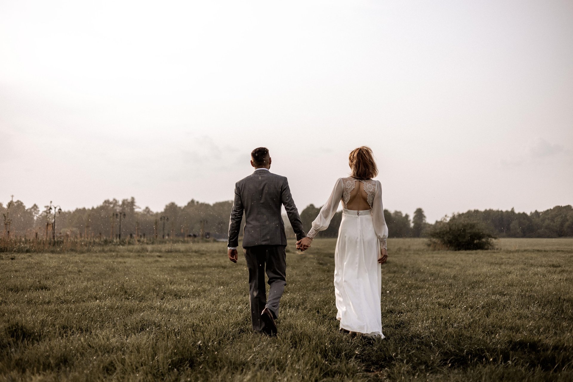 an abstract photo of a curved building with a blue sky in the background